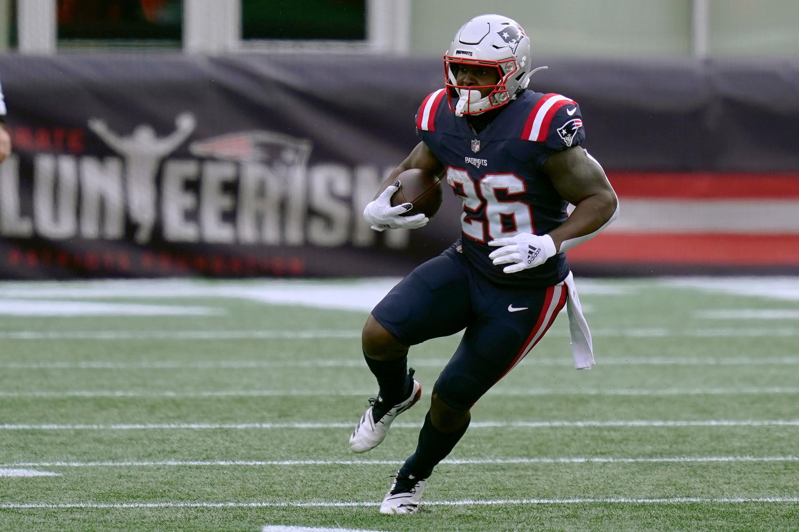 New England Patriots running back Sony Michel carries the ball in the first half of an NFL football game against the New York Jets, Sunday, Jan. 3, 2021, in Foxborough, Mass. (AP Photo/Elise Amendola)