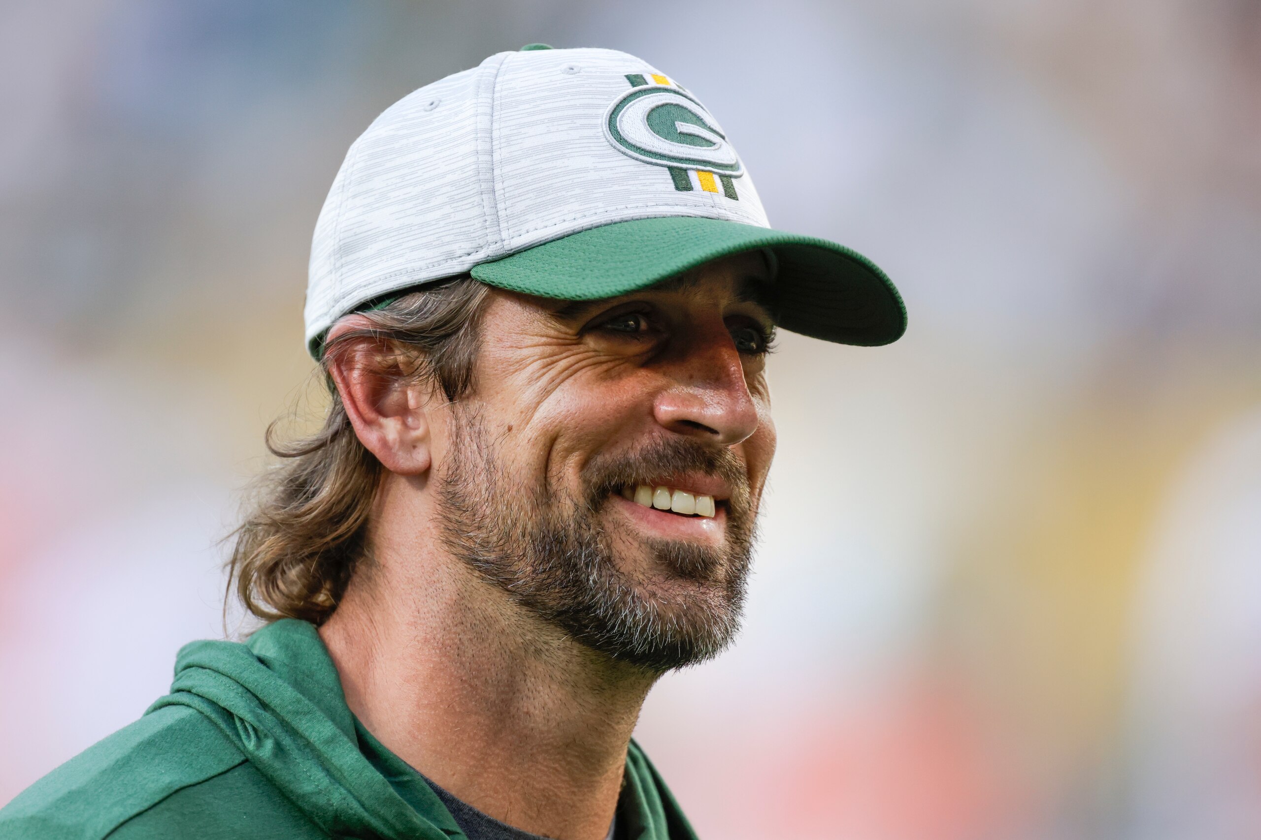 Green Bay Packers' Aaron Rodgers smiles after a preseason NFL football game against the New York Jets Saturday, Aug. 21, 2021, in Green Bay, Wis. The Jets won 23-14. (AP Photo/Matt Ludtke) Green Bay Packers' Aaron Rodgers smiles after a preseason NFL football game against the New York Jets Saturday, Aug. 21, 2021, in Green Bay, Wis. The Jets won 23-14. (AP Photo/Matt Ludtke)