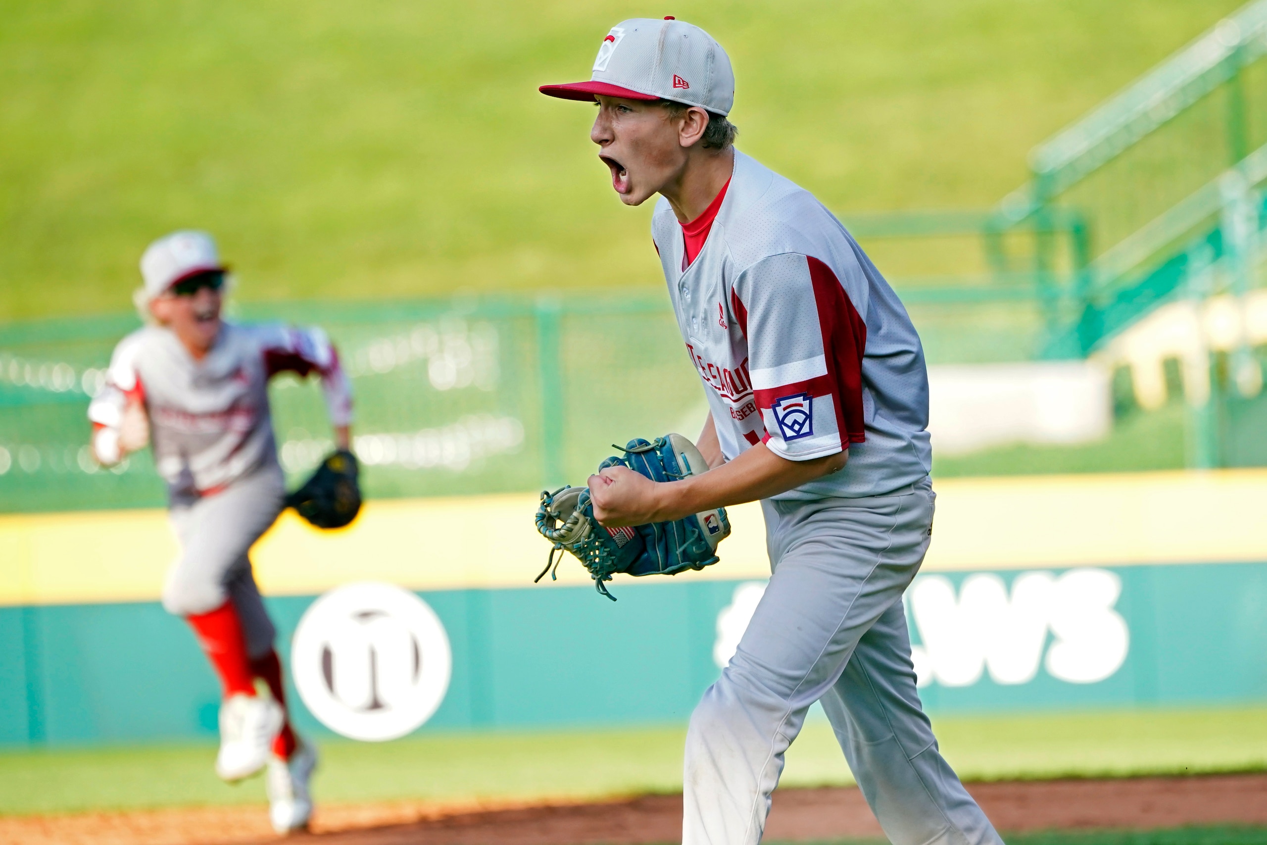 Sioux Falls, S.D.'s Gavin Weir, right, yells as he walks off the field after striking out the last Lafayette, La., batter in the fifth inning of a baseball game at the Little League World Series in South Williamsport, Pa., Friday, Aug. 20, 2021. (AP Photo/Tom E. Puskar) Sioux Falls, S.D.'s Gavin Weir, right, yells as he walks off the field after striking out the last Lafayette, La., batter in the fifth inning of a baseball game at the Little League World Series in South Williamsport, Pa., Friday, Aug. 20, 2021. (AP Photo/Tom E. Puskar)