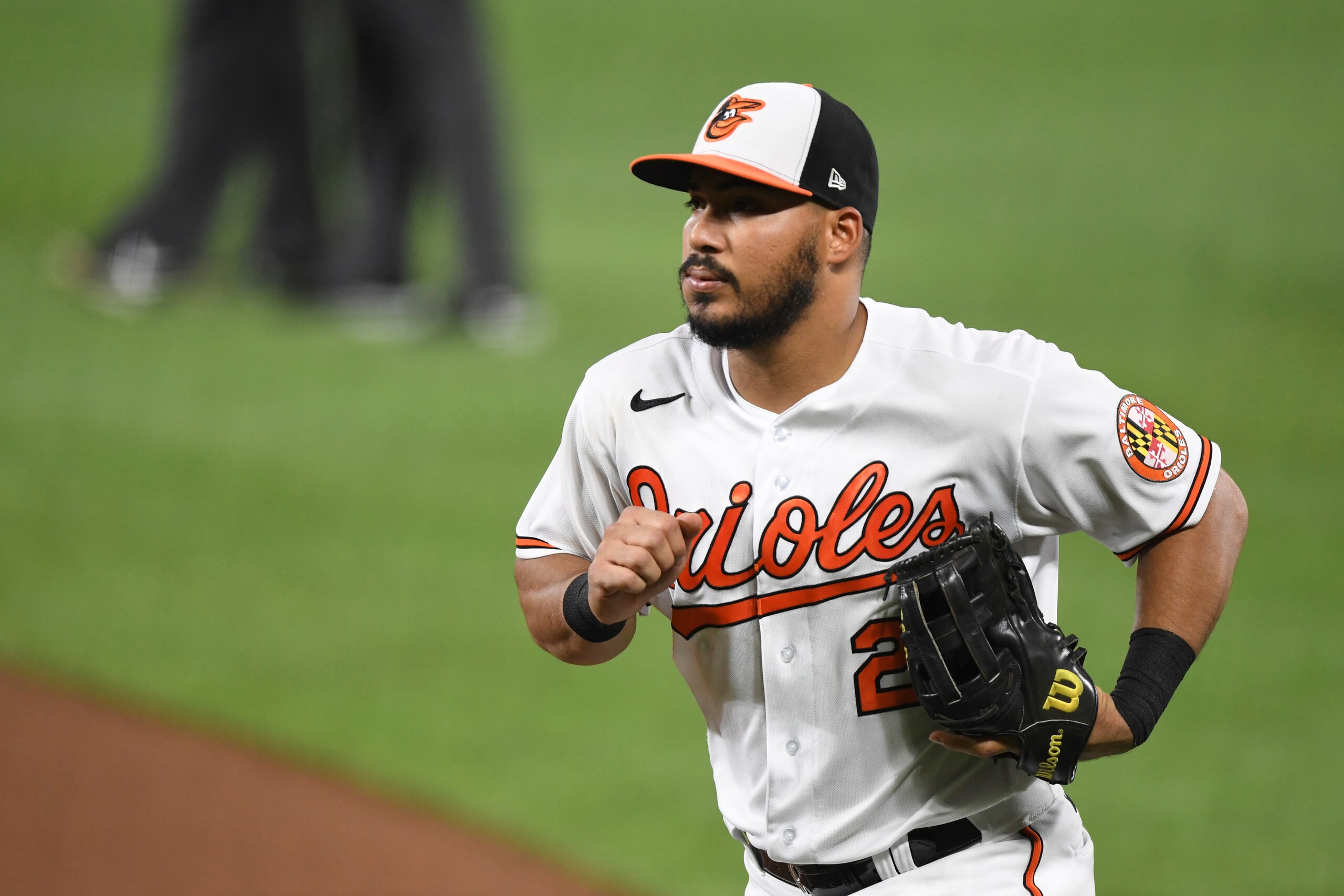 Baltimore Orioles right fielder Anthony Santander jogs off the field during the fourth inning of a baseball game against the Los Angeles Angels, Tuesday, Aug. 24, 2021, in Baltimore. (AP Photo/Terrance Williams)