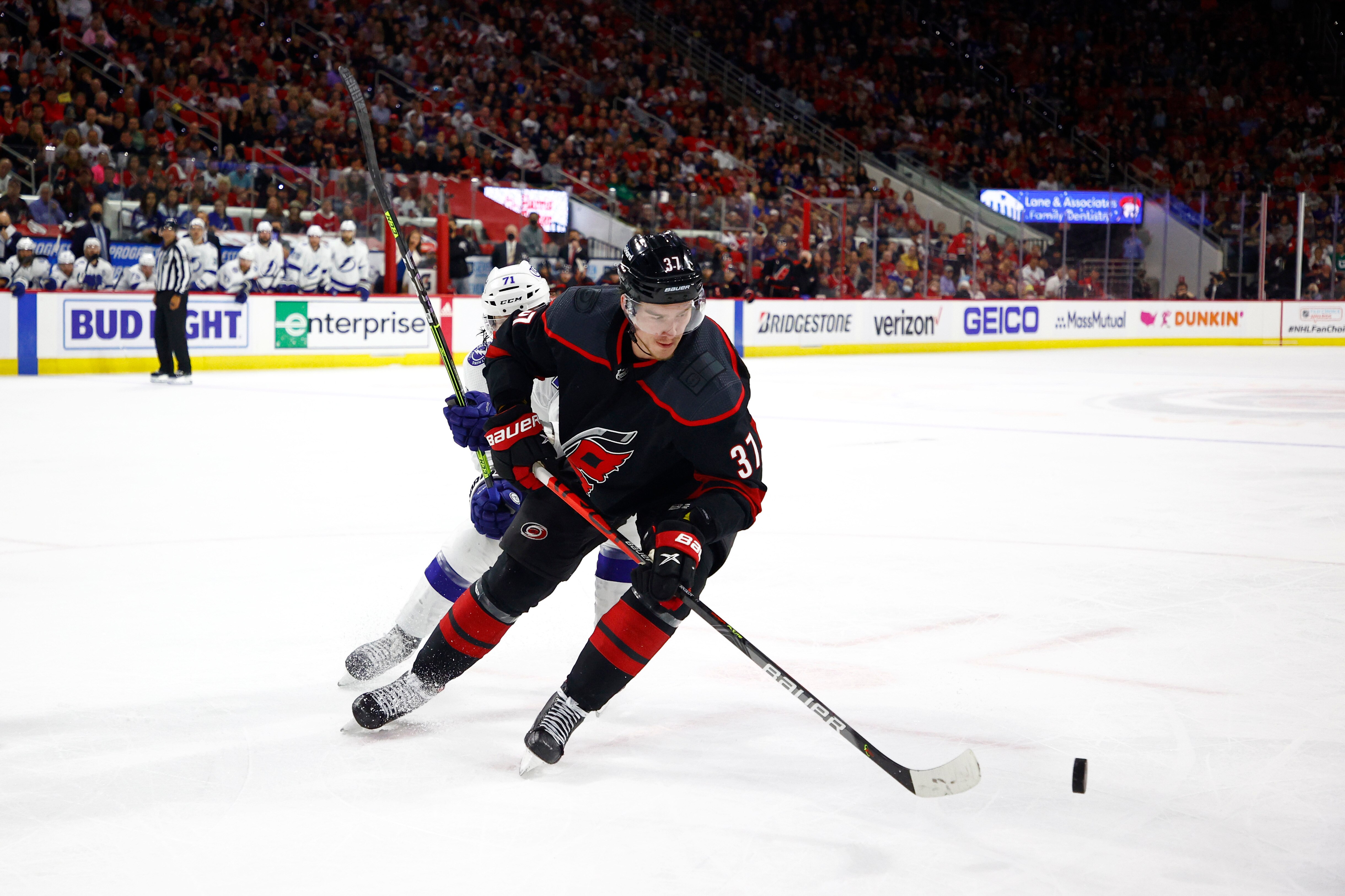 RALEIGH, NORTH CAROLINA - JUNE 08: Andrei Svechnikov #37 of the Carolina Hurricanes skates with the puck during the third period in Game Five of the Second Round of the 2021 Stanley Cup Playoffs against the Tampa Bay Lightning at PNC Arena on June 08, 2021 in Raleigh, North Carolina. (Photo by Jared C. Tilton/Getty Images)