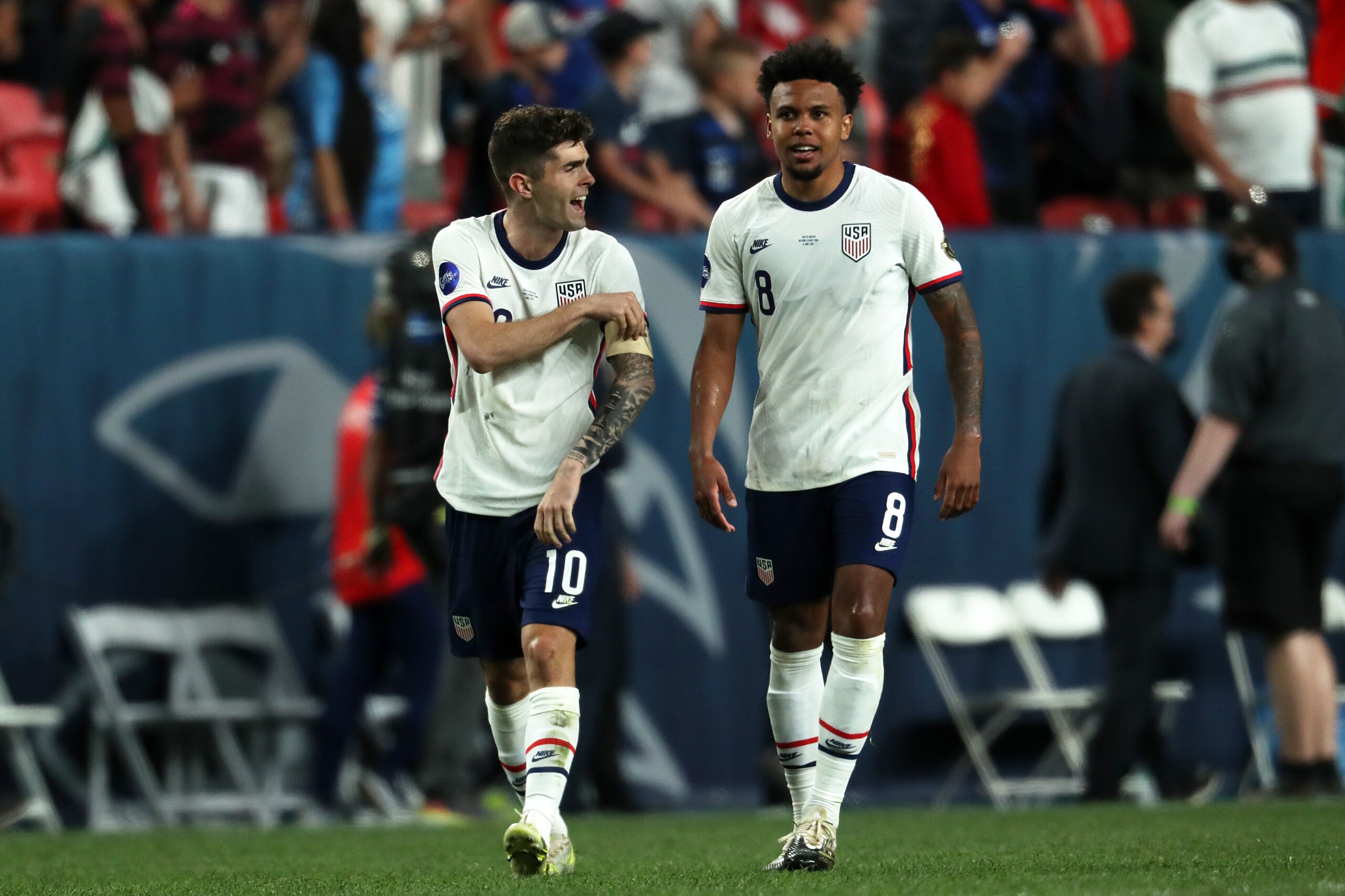 DENVER, CO - JUNE 06: Christian Pulisic #10 and Weston McKennie #8 of United States celebrates after scores during the CONCACAF Nations League Championship Final between United States and Mexico at Empower Field At Mile High on June 6, 2021 in Denver, Colorado. (Photo by Omar Vega/Getty Images)