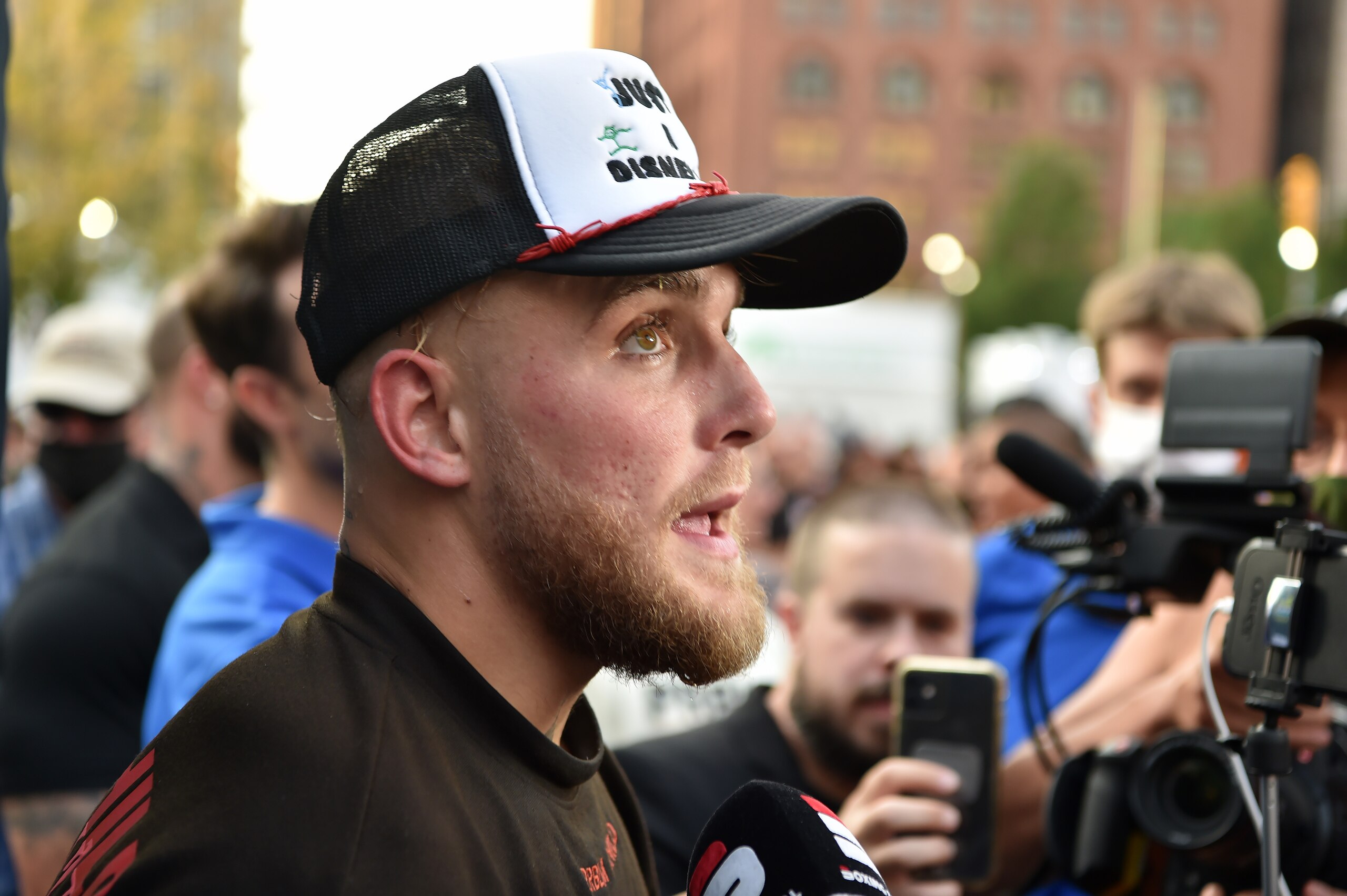 CLEVELAND, OHIO - AUGUST 25: Jake Paul talks to the press after a media work out at Cleveland Public Square ahead of his August 29 fight with Tyron Woodley on August 25, 2021 in Cleveland, Ohio. (Photo by Jason Miller/Getty Images)