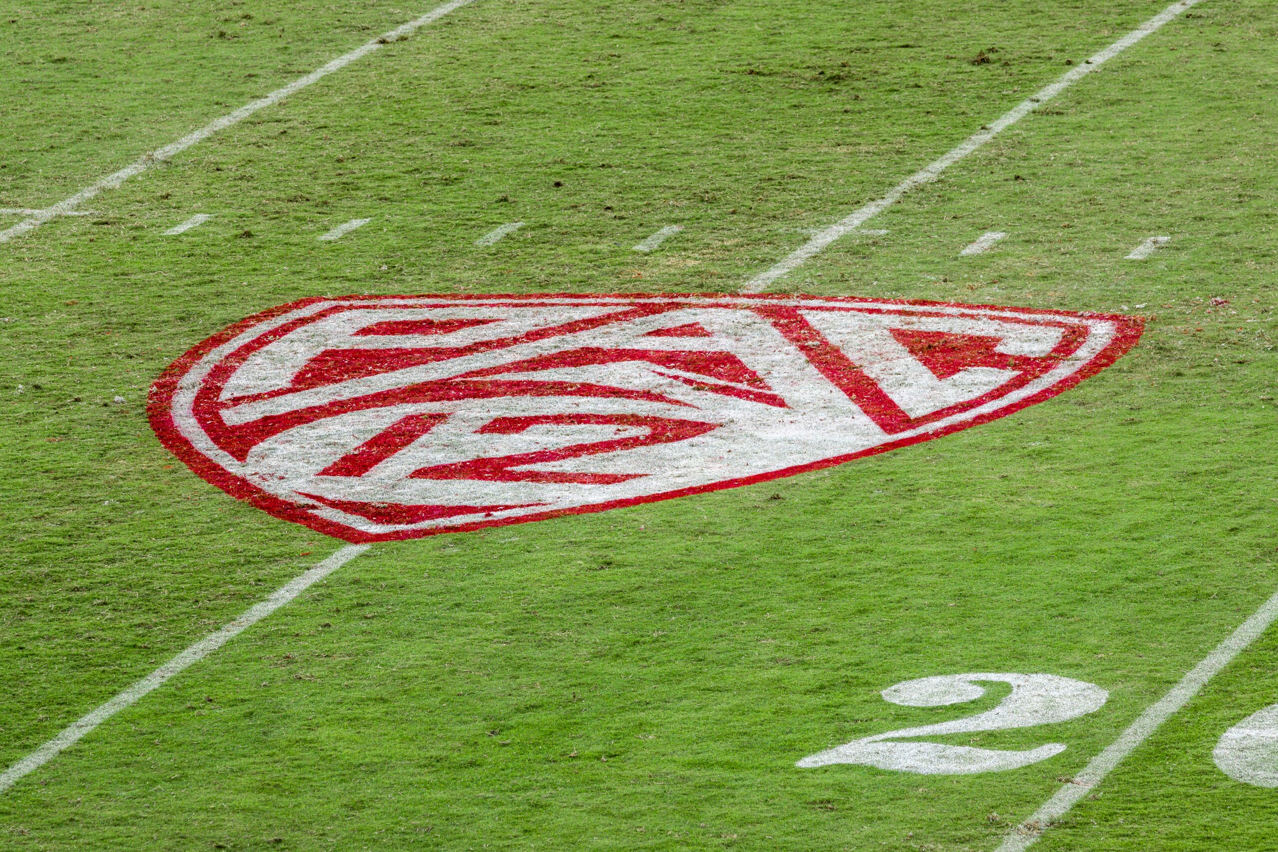 PALO ALTO, CA - NOVEMBER 14:  A high angle view of the Pac-12 logo on the field at Stanford Stadium during a game between the Stanford Cardinal and the Colorado Buffaloes played on November 14, 2020 in Palo Alto, California.  (Photo by David Madison/Getty Images)