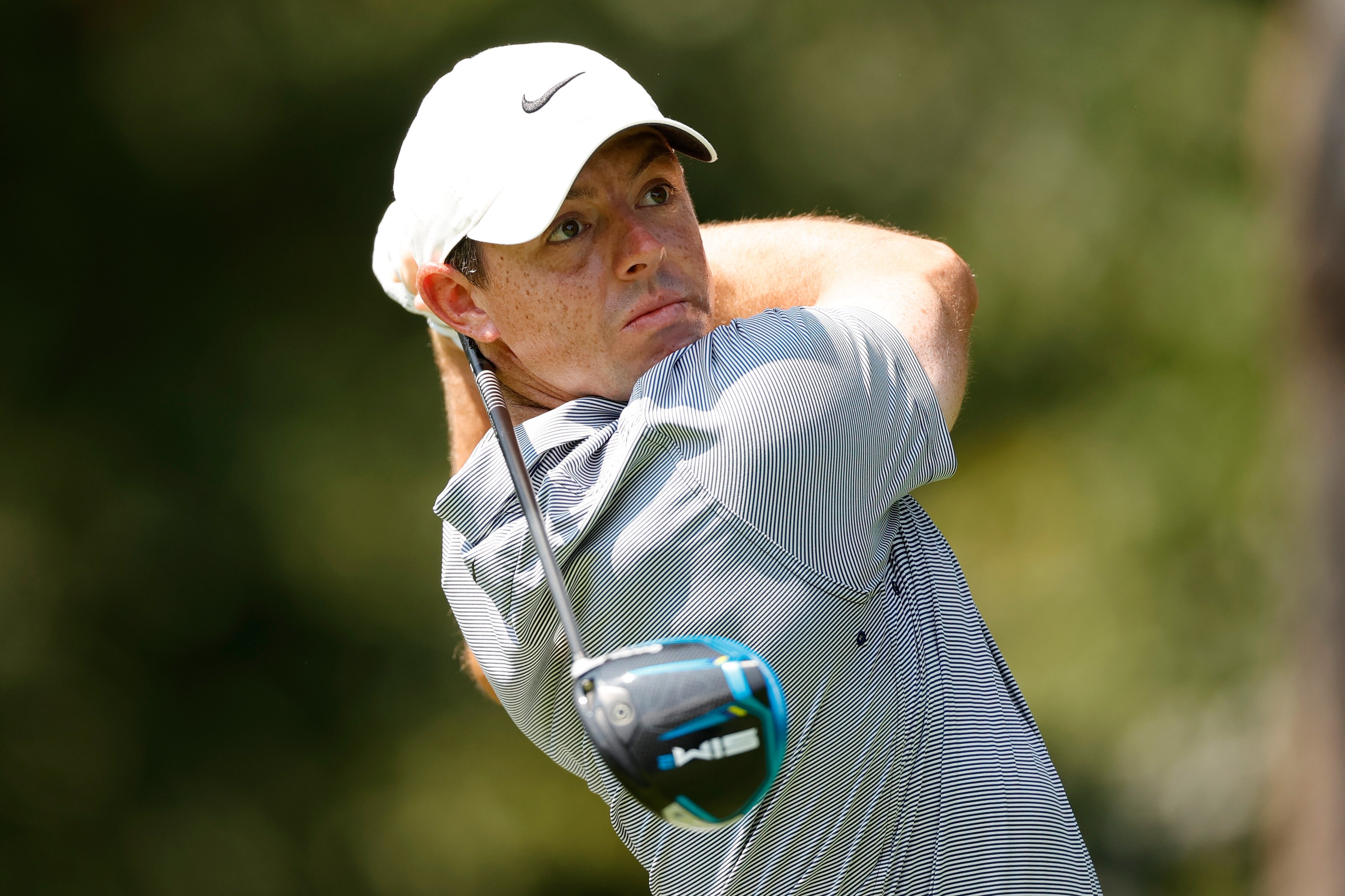 OWINGS MILLS, MARYLAND - AUGUST 26: Rory McIlroy of Northern Ireland plays his shot from the second tee during the first round of the BMW Championship at Caves Valley Golf Club on August 26, 2021 in Owings Mills, Maryland. (Photo by Tim Nwachukwu/Getty Images)