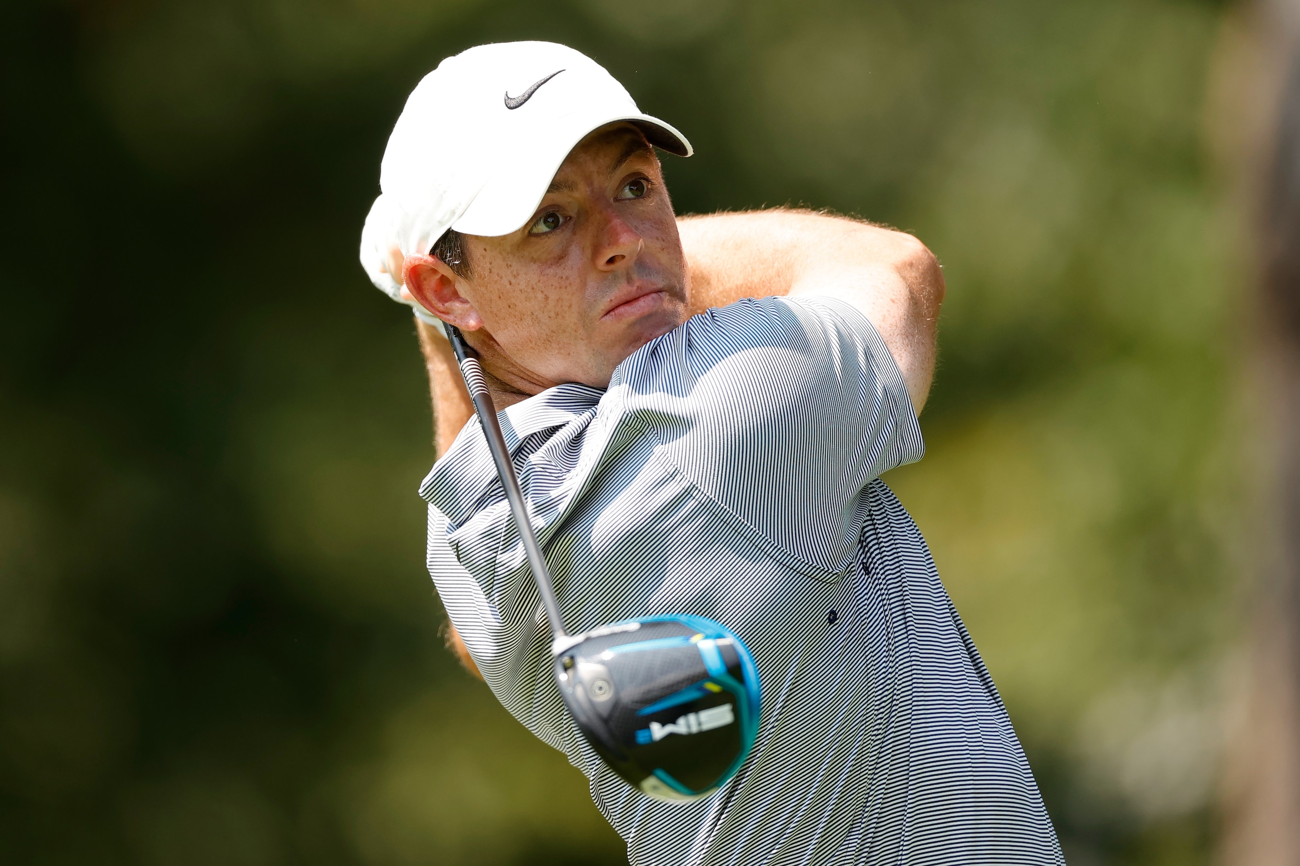 OWINGS MILLS, MARYLAND - AUGUST 26: Rory McIlroy of Northern Ireland plays his shot from the second tee during the first round of the BMW Championship at Caves Valley Golf Club on August 26, 2021 in Owings Mills, Maryland. (Photo by Tim Nwachukwu/Getty Images)