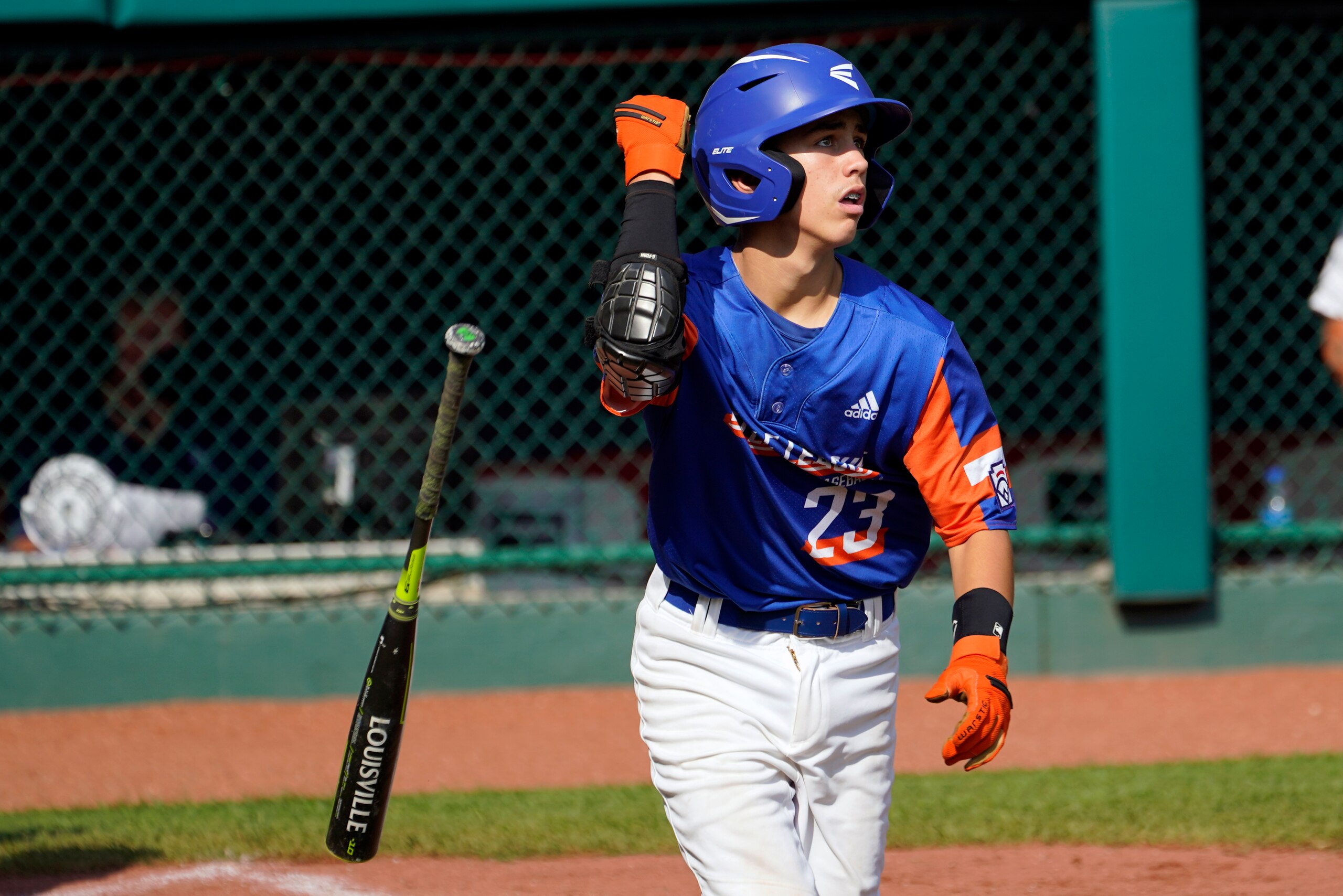 Taylor, Mich.'s Cameron Thorning (23) tosses his bat as he watches his two-run home run off of Abilene, Texas' Myles McCarty during the third inning of a baseball game at the Little League World Series tournament in South Williamsport, Pa., Thursday, Aug. 26, 2021. Michigan won 15-6. (AP Photo/Tom E. Puskar)