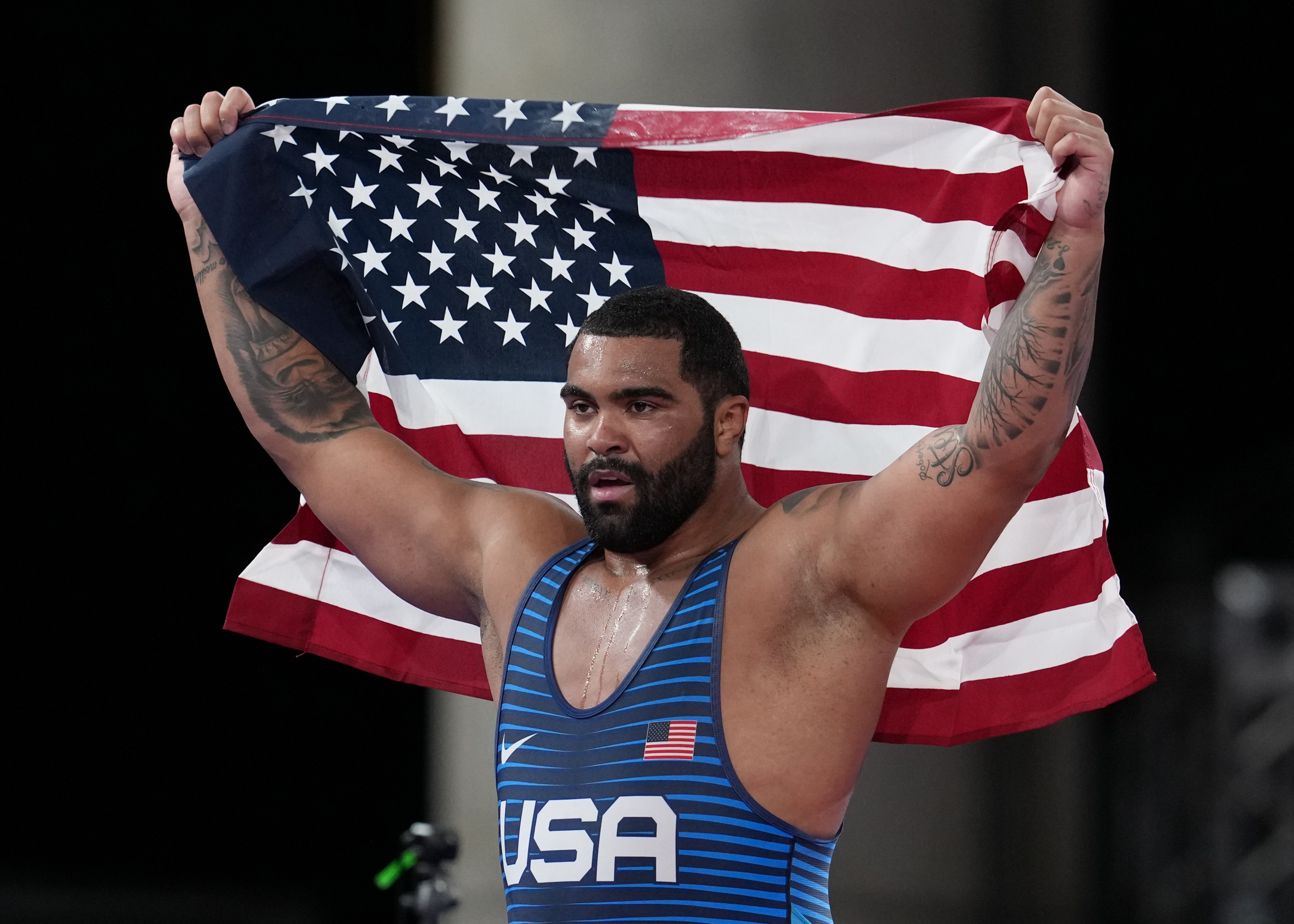 CHIBA, JAPAN AUGUST 6, 2021: Gold medalist USA's Gable Dan Steveson celebrates the golden medal after the men's freestyle 125kg wrestling competition during the Tokyo 2020 Olympic Games at the Makuhari Messe in Tokyo on August 6, 2021. ( (Photo by Stringer/Anadolu Agency via Getty Images)