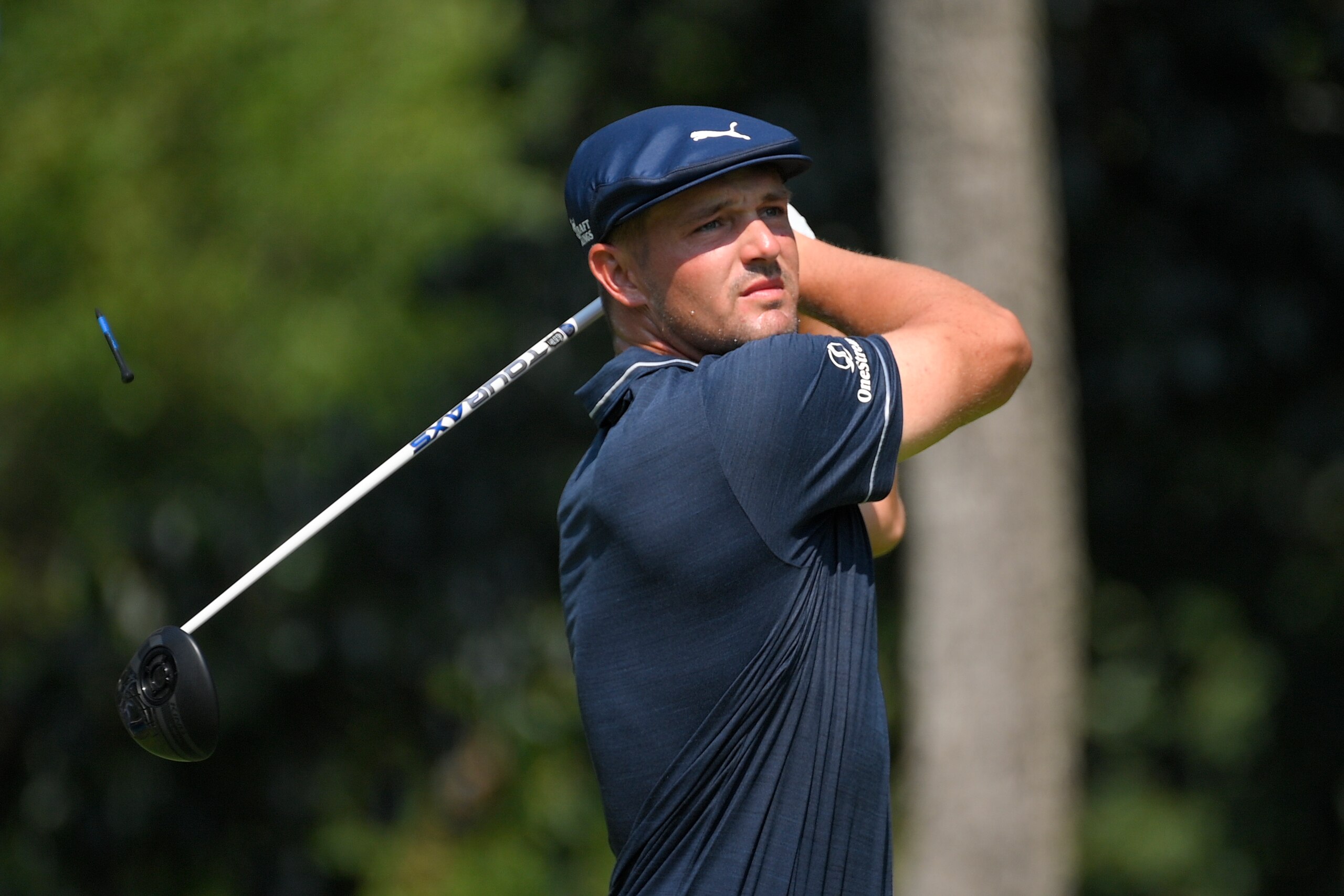 Bryson DeChambeau tees off from the second hole during the second round of the BMW Championship golf tournament, Friday, Aug. 27, 2021, at Caves Valley Golf Club in Owings Mills, Md. (AP Photo/Nick Wass)