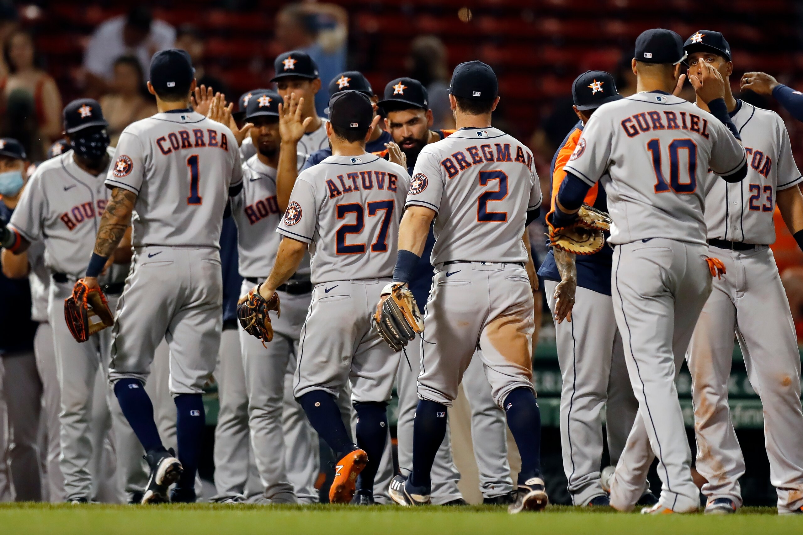 The Houston Astros celebrate after defeating the Boston Red Sox in a baseball game Wednesday, June 9, 2021, in Boston. (AP Photo/Michael Dwyer)