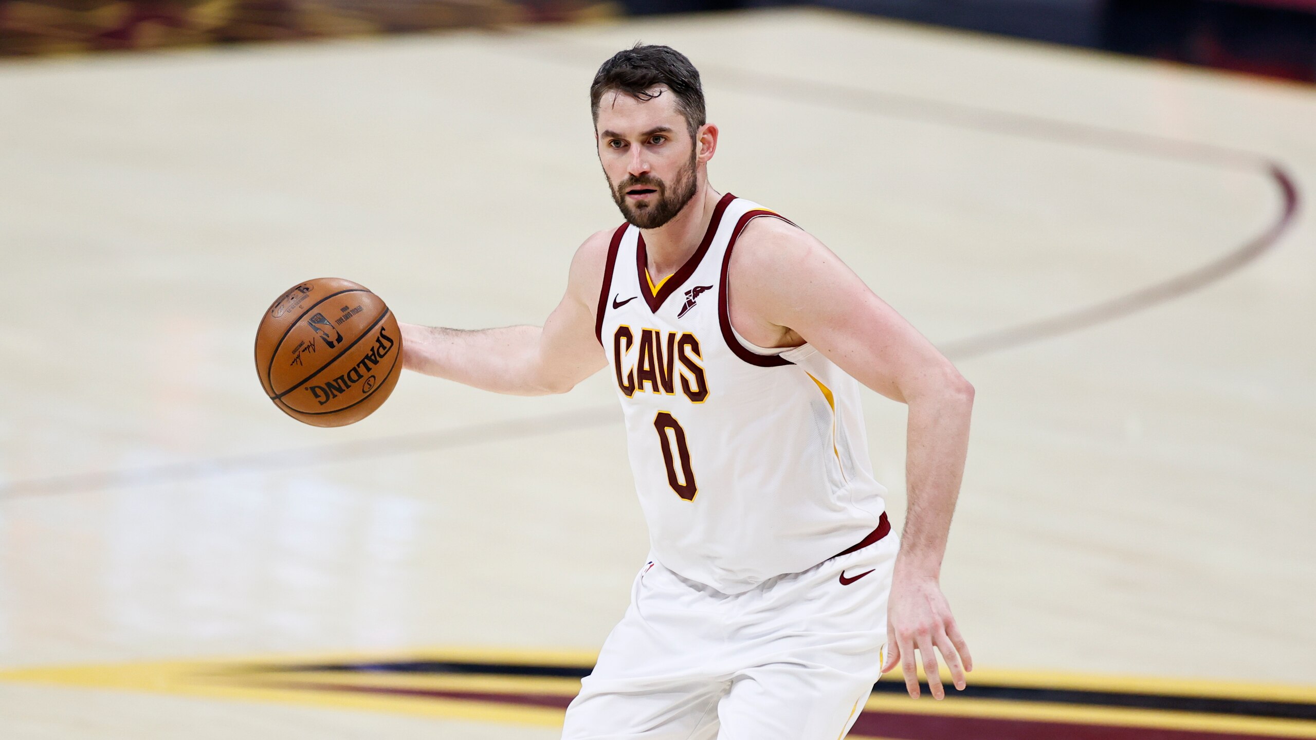 Cleveland Cavaliers' Kevin Love (0) plays against the Washington Wizards during the first half of an NBA basketball game, Friday, April 30, 2021, in Cleveland. (AP Photo/Ron Schwane)