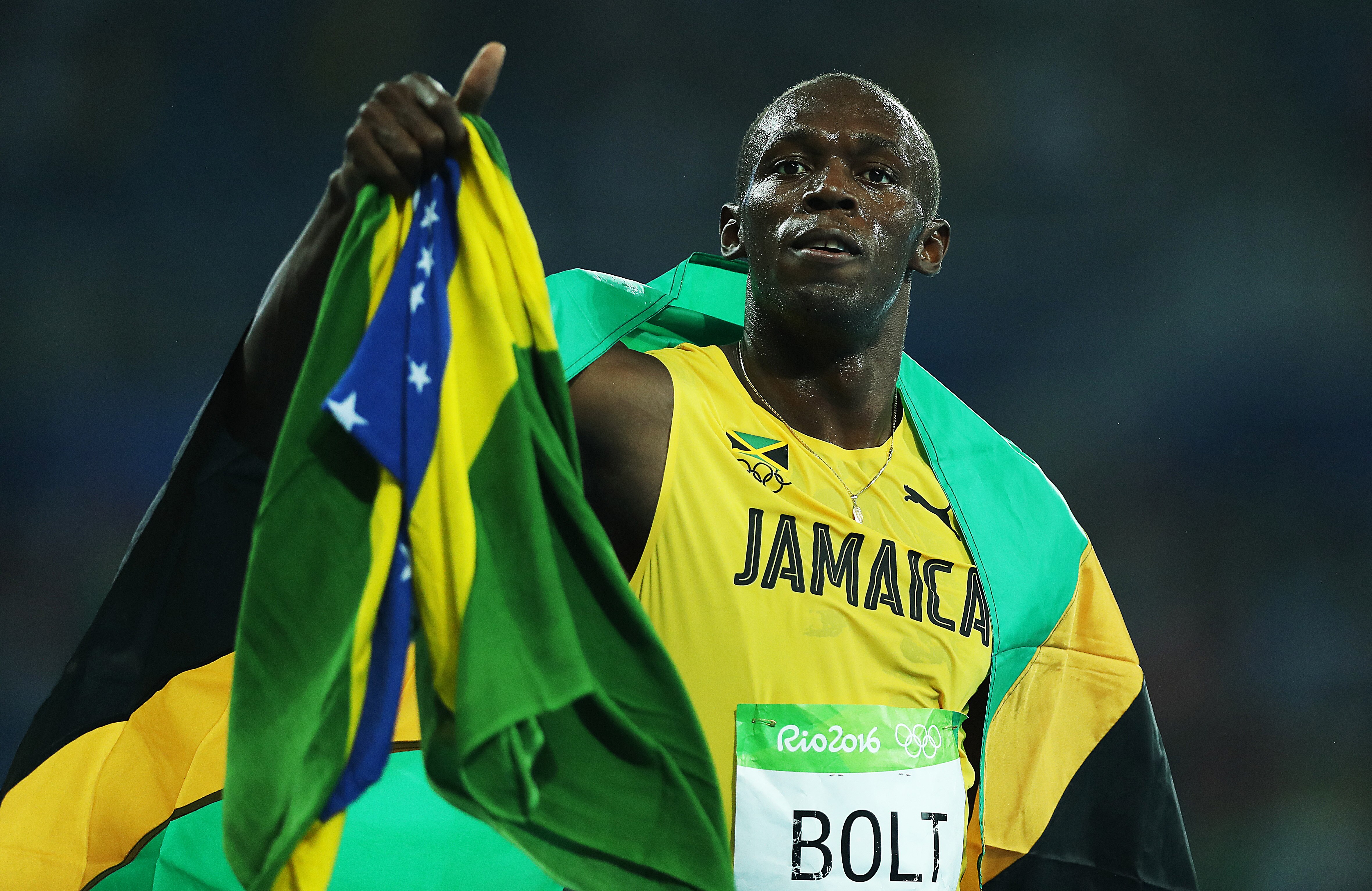 RIO DE JANEIRO, BRAZIL - AUGUST 18: Usain Bolt of Jamaica celebrates after he wins Gold in the final of the Men's 200m on Day 13 of the Rio 2016 Olympic Games at the Olympic Stadium on August 18, 2016 in Rio de Janeiro, Brazil. (Photo by Ian MacNicol/Getty Images)