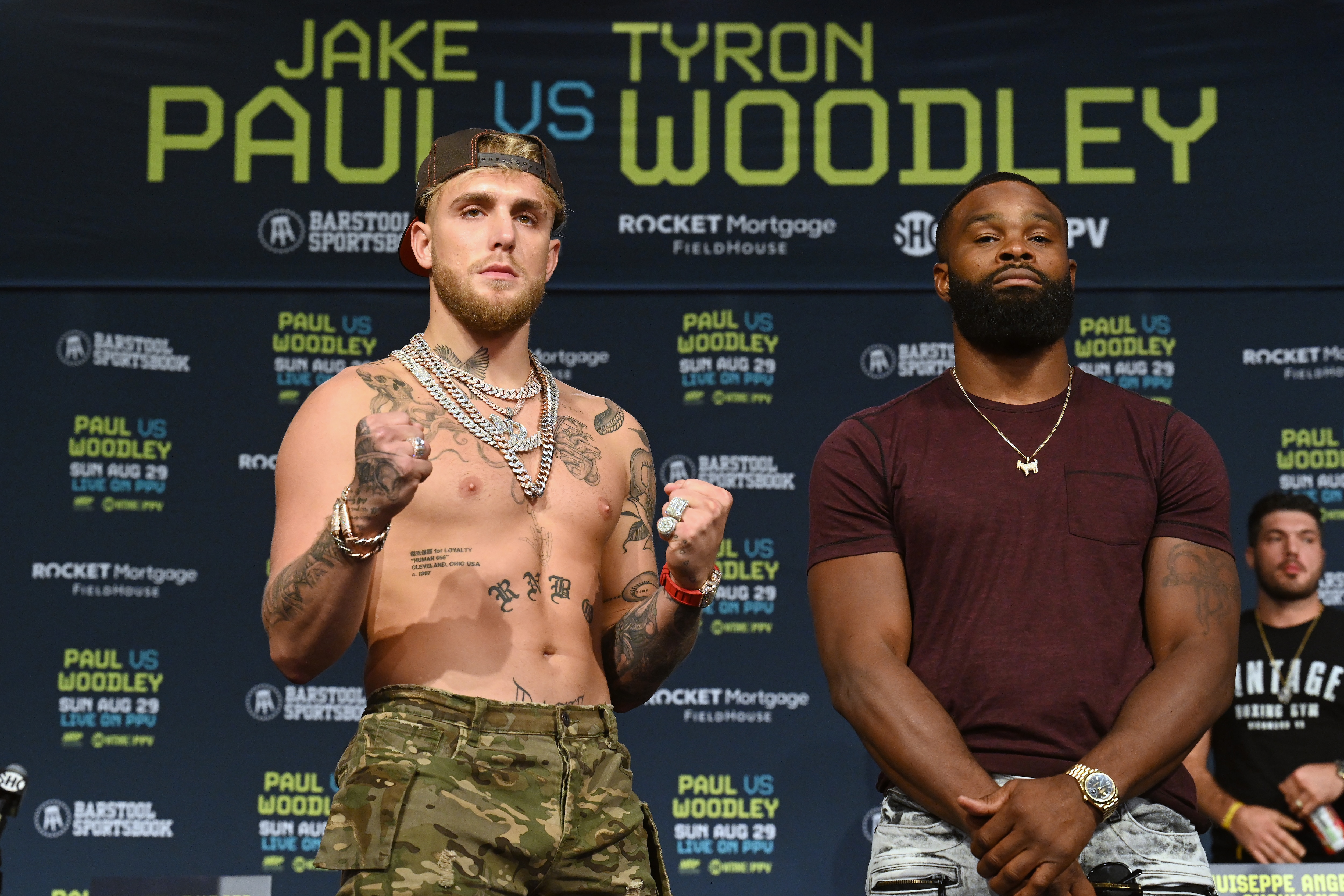 CLEVELAND, OHIO - AUGUST 26: Jake Paul and Tyron Woodley pose during a press conference at the Hilton Cleveland Downtown prior to their August 29 fight on August 26, 2021 in Cleveland, Ohio. (Photo by Jason Miller/Getty Images)