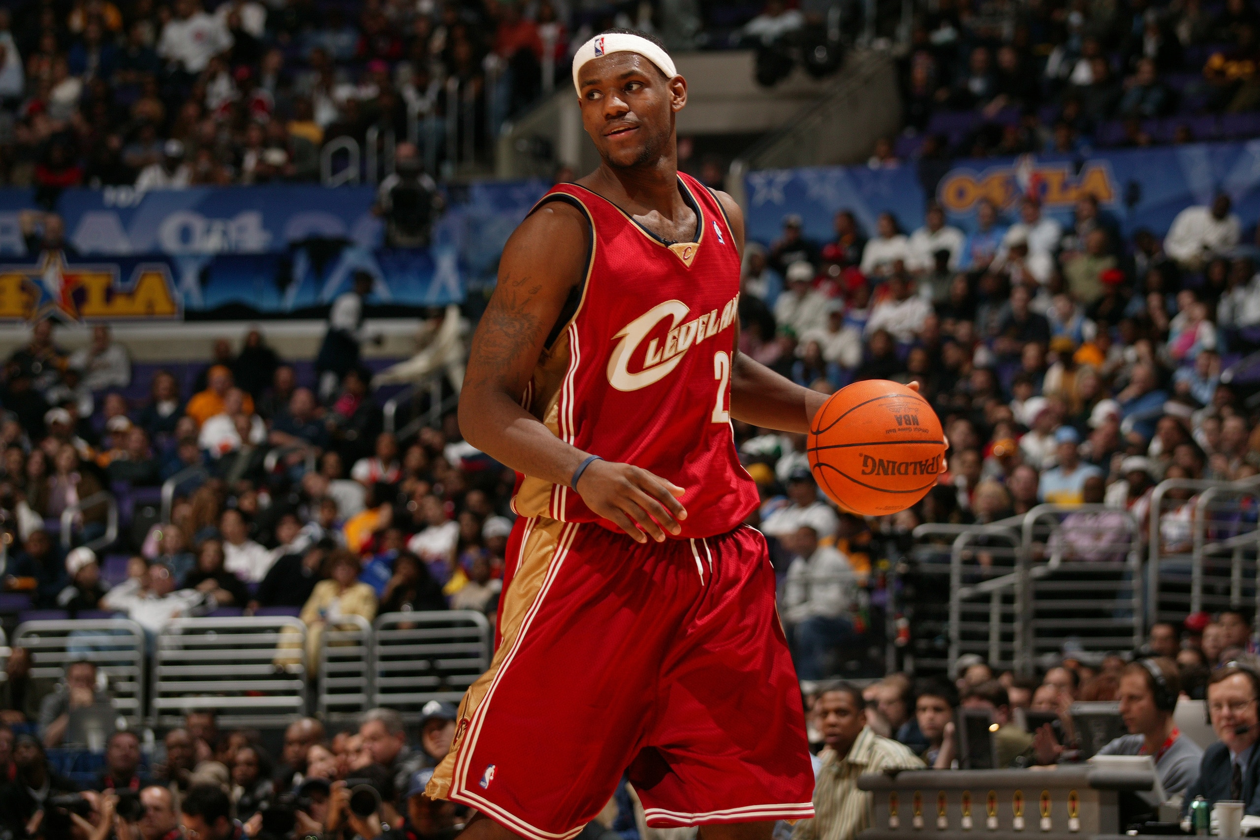 LOS ANGELES, CA - FEBRUARY 13: LeBron James #23 of the Cleveland Cavaliers handles the ball during the Rookie Challenge Presented by Got Milk as part of 2004 NBA All Star Weekend on February 13, 2004 in Los Angeles, California. NOTE TO USER: User expressly acknowledges and agrees that, by downloading and/or using this Photograph, User is consenting to the terms and conditions of the Getty Images License Agreement (Photo by Jesse D. Garrabrant/NBAE via Getty Images) LOS ANGELES, CA - FEBRUARY 13: LeBron James #23 of the Cleveland Cavaliers handles the ball during the Rookie Challenge Presented by Got Milk as part of 2004 NBA All Star Weekend on February 13, 2004 in Los Angeles, California. NOTE TO USER: User expressly acknowledges and agrees that, by downloading and/or using this Photograph, User is consenting to the terms and conditions of the Getty Images License Agreement (Photo by Jesse D. Garrabrant/NBAE via Getty Images)