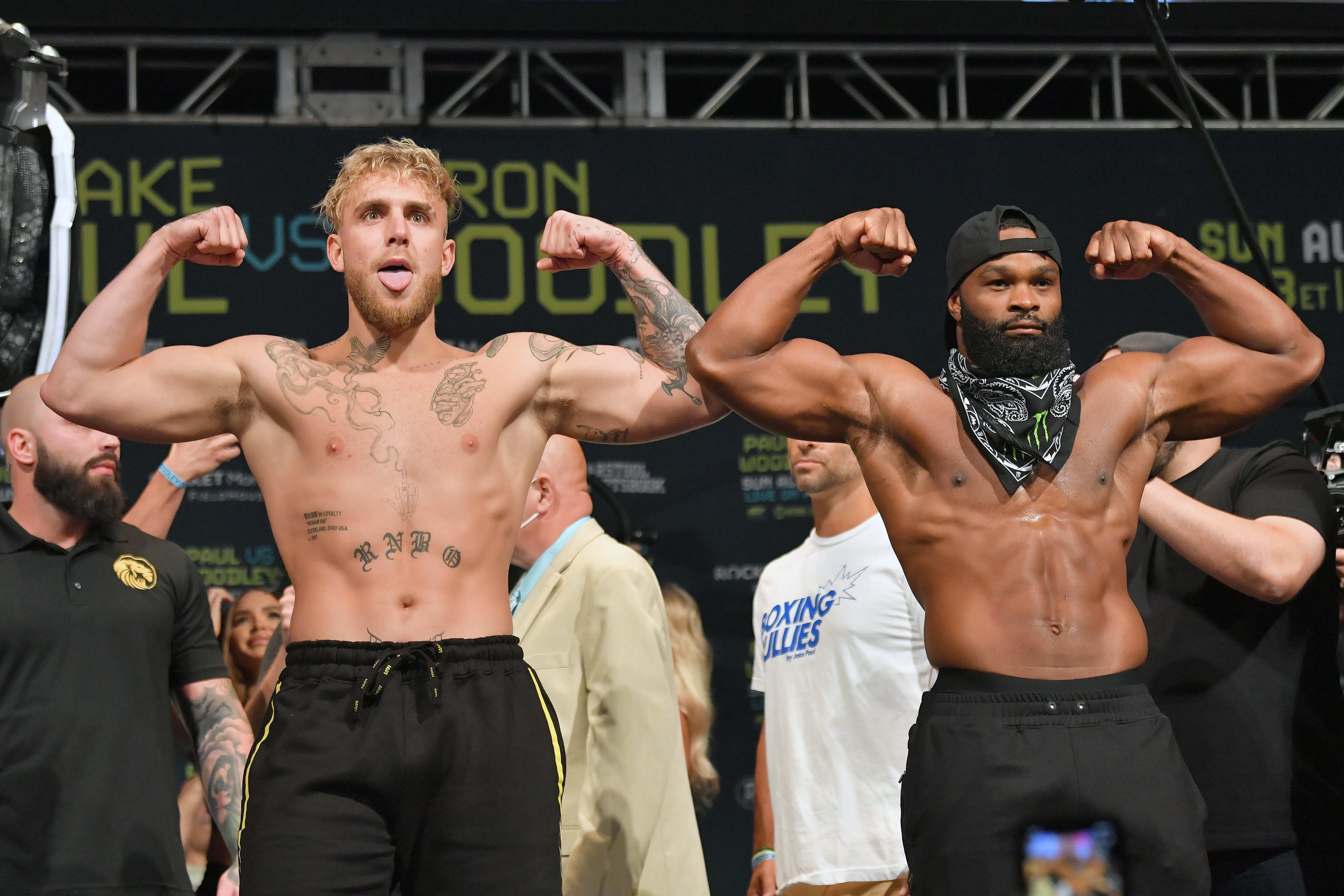 CLEVELAND, OHIO - AUGUST 28: Jake Paul and Tyron Woodley pose during the weigh in event at the State Theater prior to their August 29 fight on August 28, 2021 in Cleveland, Ohio. (Photo by Jason Miller/Getty Images)