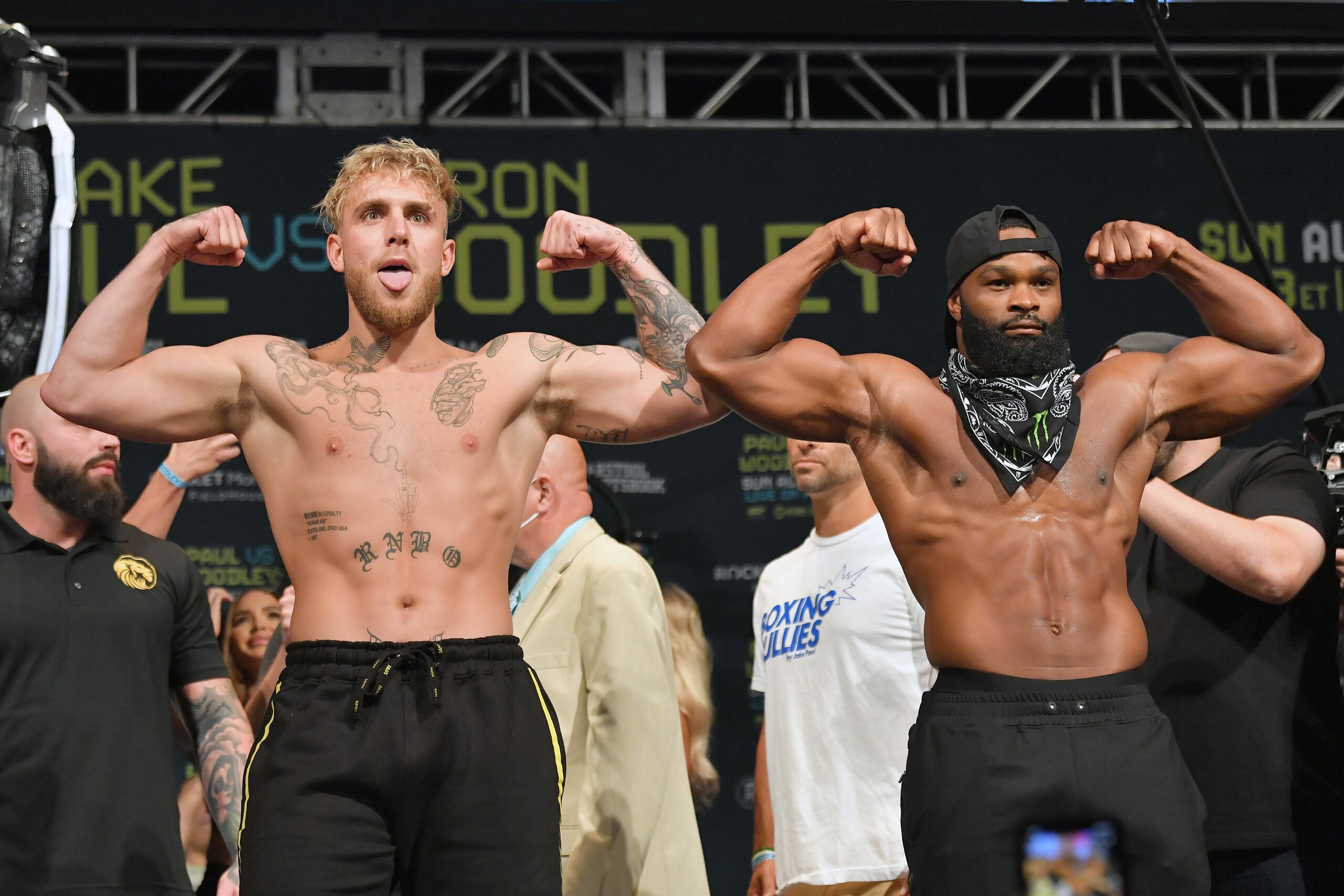 CLEVELAND, OHIO - AUGUST 28: Jake Paul and Tyron Woodley pose during the weigh in event at the State Theater prior to their August 29 fight on August 28, 2021 in Cleveland, Ohio. (Photo by Jason Miller/Getty Images)