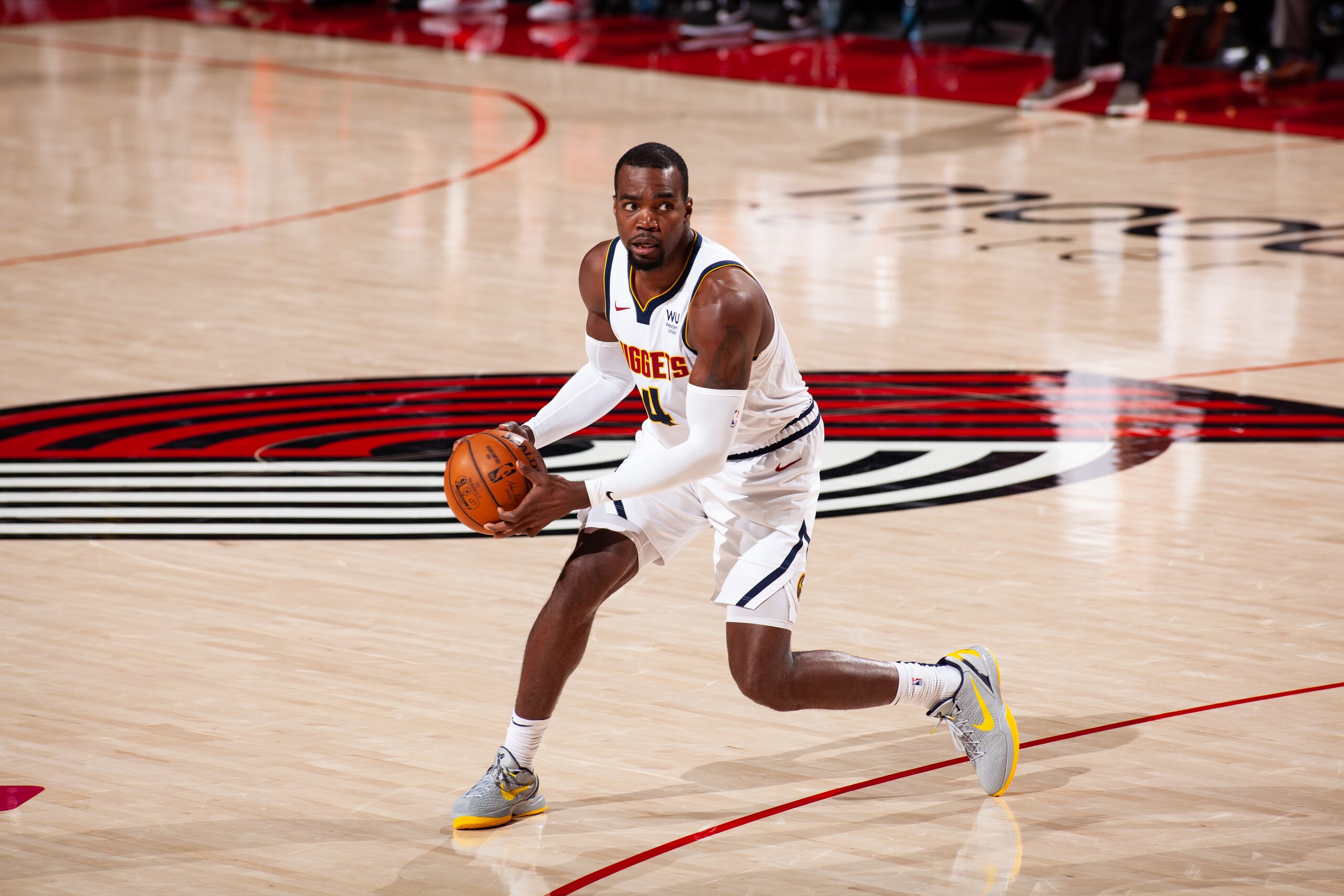PORTLAND, OR - JUNE 3: Paul Millsap #4 of the Denver Nuggets handles the ball during the game against the Portland Trail Blazers during Round 1, Game 6 of the 2021 NBA Playoffs on June 3, 2021 at the Moda Center Arena in Portland, Oregon. NOTE TO USER: User expressly acknowledges and agrees that, by downloading and or using this photograph, user is consenting to the terms and conditions of the Getty Images License Agreement. Mandatory Copyright Notice: Copyright 2021 NBAE (Photo by Cameron Browne/NBAE via Getty Images)
