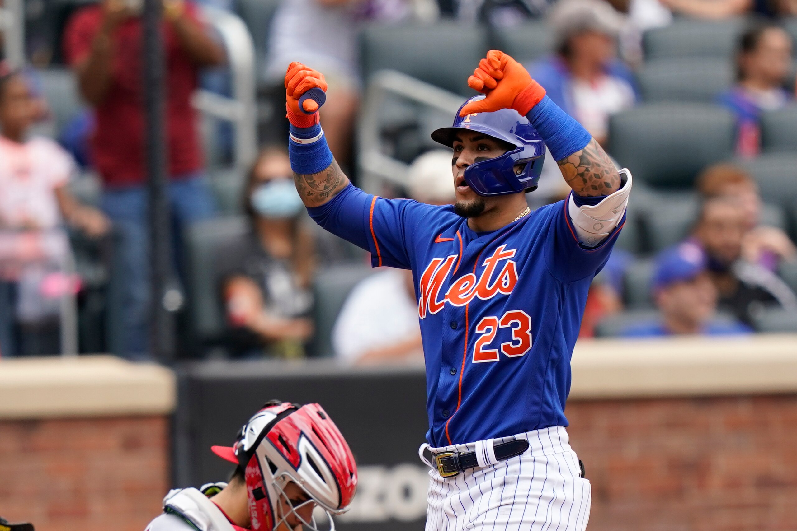 New York Mets' Javier Baez gestures at home plate after his two-run home run that also scored Michael Conforto during the fourth inning of a baseball game against the Washington Nationals, Sunday, Aug. 29, 2021, in New York. (AP Photo/Corey Sipkin) New York Mets' Javier Baez gestures at home plate after his two-run home run that also scored Michael Conforto during the fourth inning of a baseball game against the Washington Nationals, Sunday, Aug. 29, 2021, in New York. (AP Photo/Corey Sipkin)