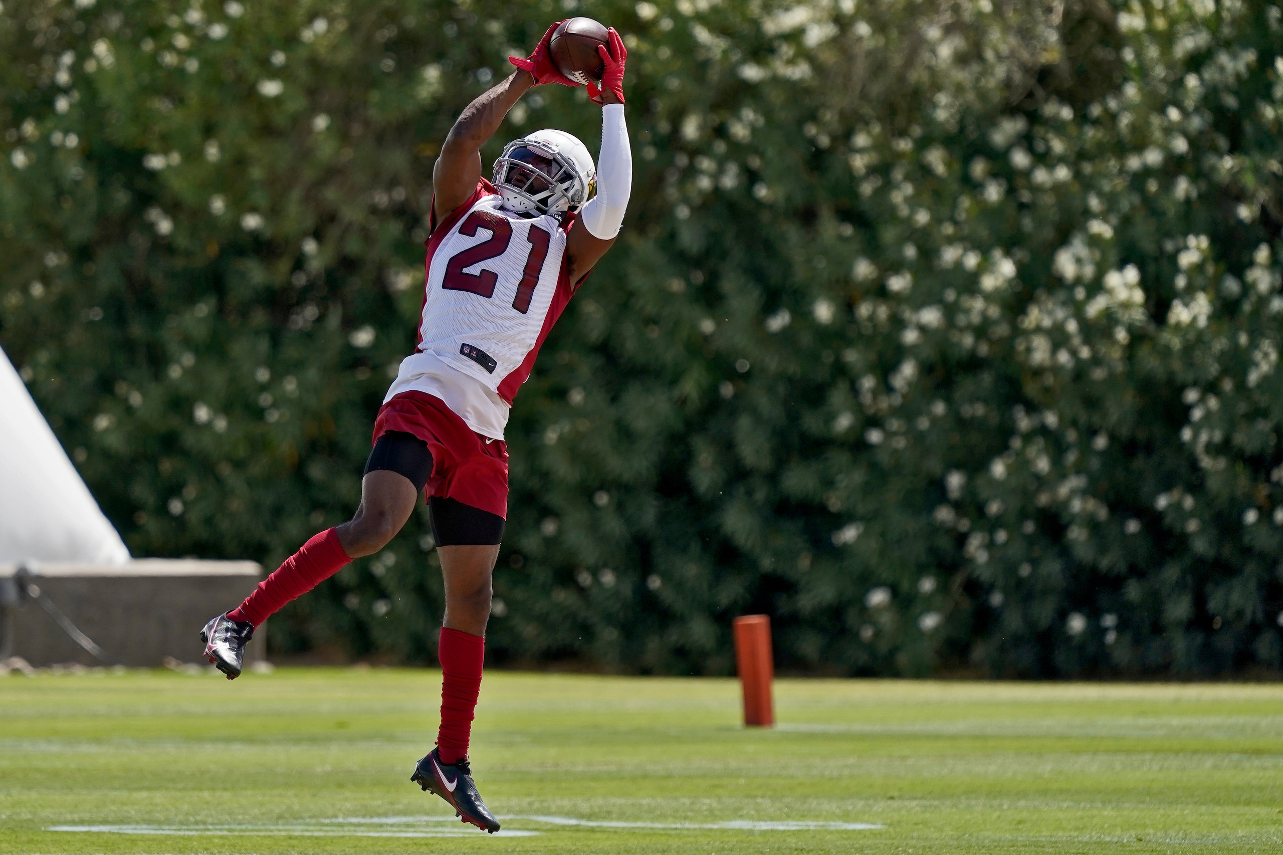 Arizona Cardinals cornerback Malcolm Butler (21) runs drills during an NFL football minicamp, Tuesday, June 8, 2021, in Tempe, Ariz. (AP Photo/Matt York)