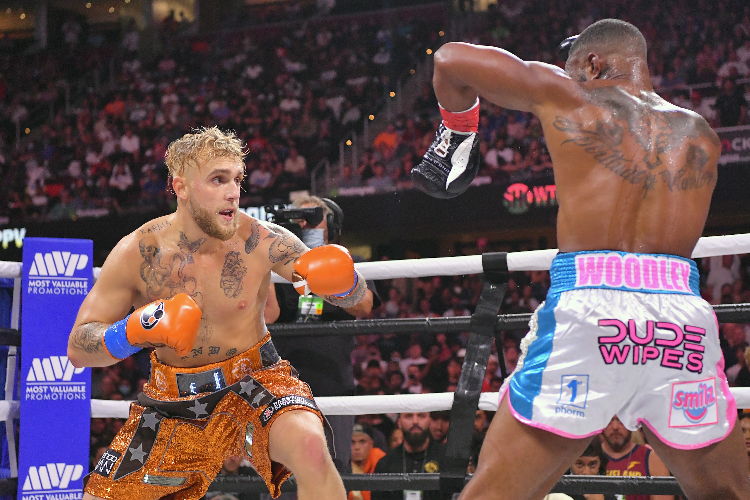 CLEVELAND, OHIO - AUGUST 29: Jake Paul fights Tyron Woodley in their cruiserweight bout during a Showtime pay-per-view event at Rocket Morgage Fieldhouse on August 29, 2021 in Cleveland, Ohio. (Photo by Jason Miller/Getty Images) CLEVELAND, OHIO - AUGUST 29: Jake Paul fights Tyron Woodley in their cruiserweight bout during a Showtime pay-per-view event at Rocket Morgage Fieldhouse on August 29, 2021 in Cleveland, Ohio. (Photo by Jason Miller/Getty Images)