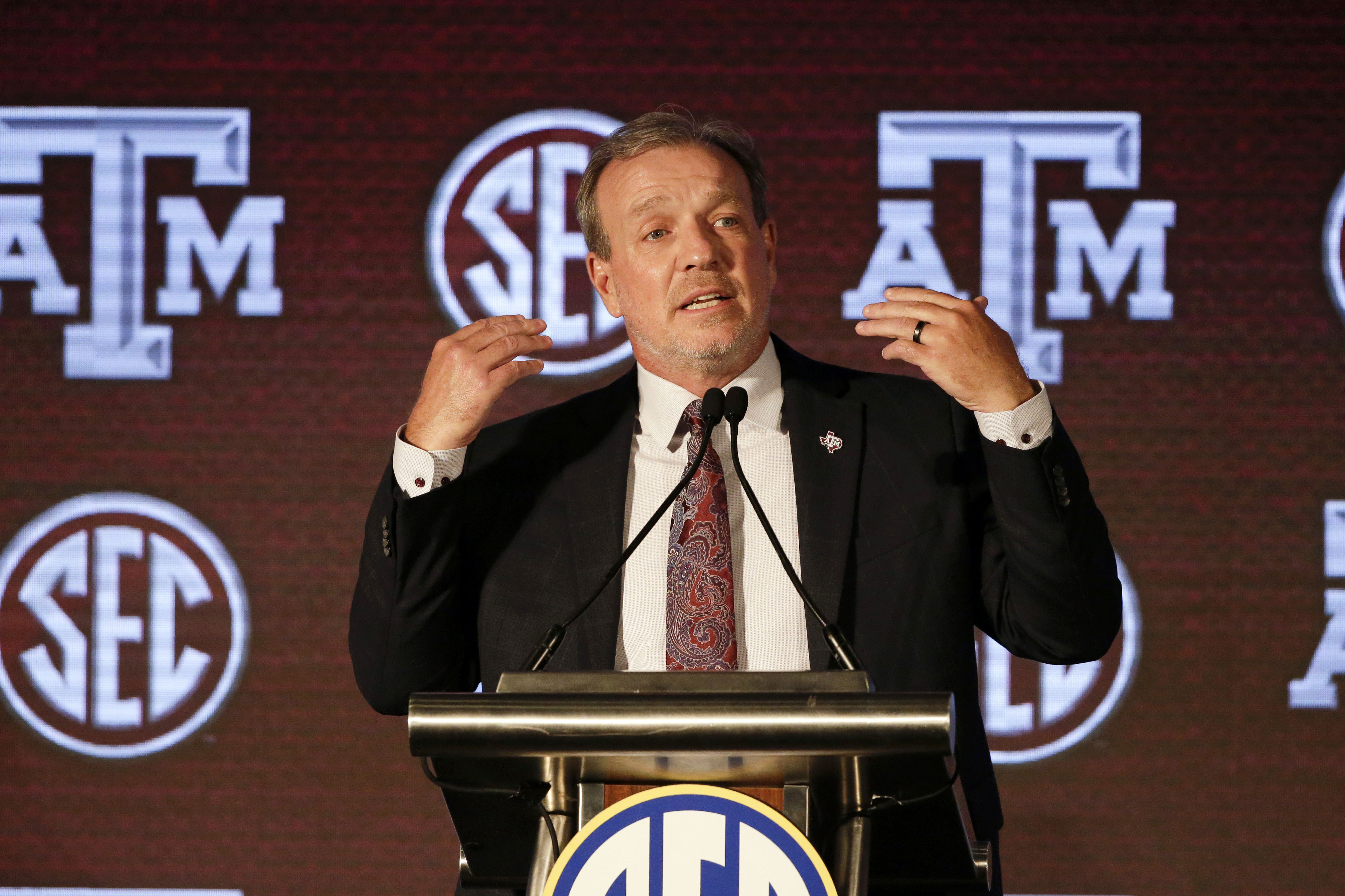 FILE - In this July 21, 20121, file photo, Texas A & M head coach Jimbo Fisher speaks to reporters during the NCAA college football Southeastern Conference Media Days in Hoover, Ala. Fisher enters the fourth season of his massive $75 million contract at Texas A&M having elevated the Aggies to among the top programs in the country. Now the challenge for Fisher and the Aggies is to take the next step and contend for their first national title since 1939. (AP Photo/Butch Dill, File)