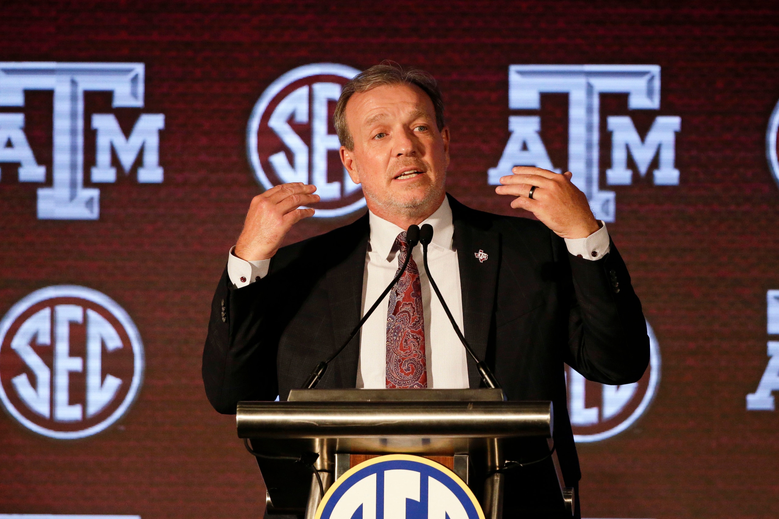 FILE - In this July 21, 20121, file photo, Texas A & M head coach Jimbo Fisher speaks to reporters during the NCAA college football Southeastern Conference Media Days in Hoover, Ala. Fisher enters the fourth season of his massive $75 million contract at Texas A&M having elevated the Aggies to among the top programs in the country. Now the challenge for Fisher and the Aggies is to take the next step and contend for their first national title since 1939. (AP Photo/Butch Dill, File)