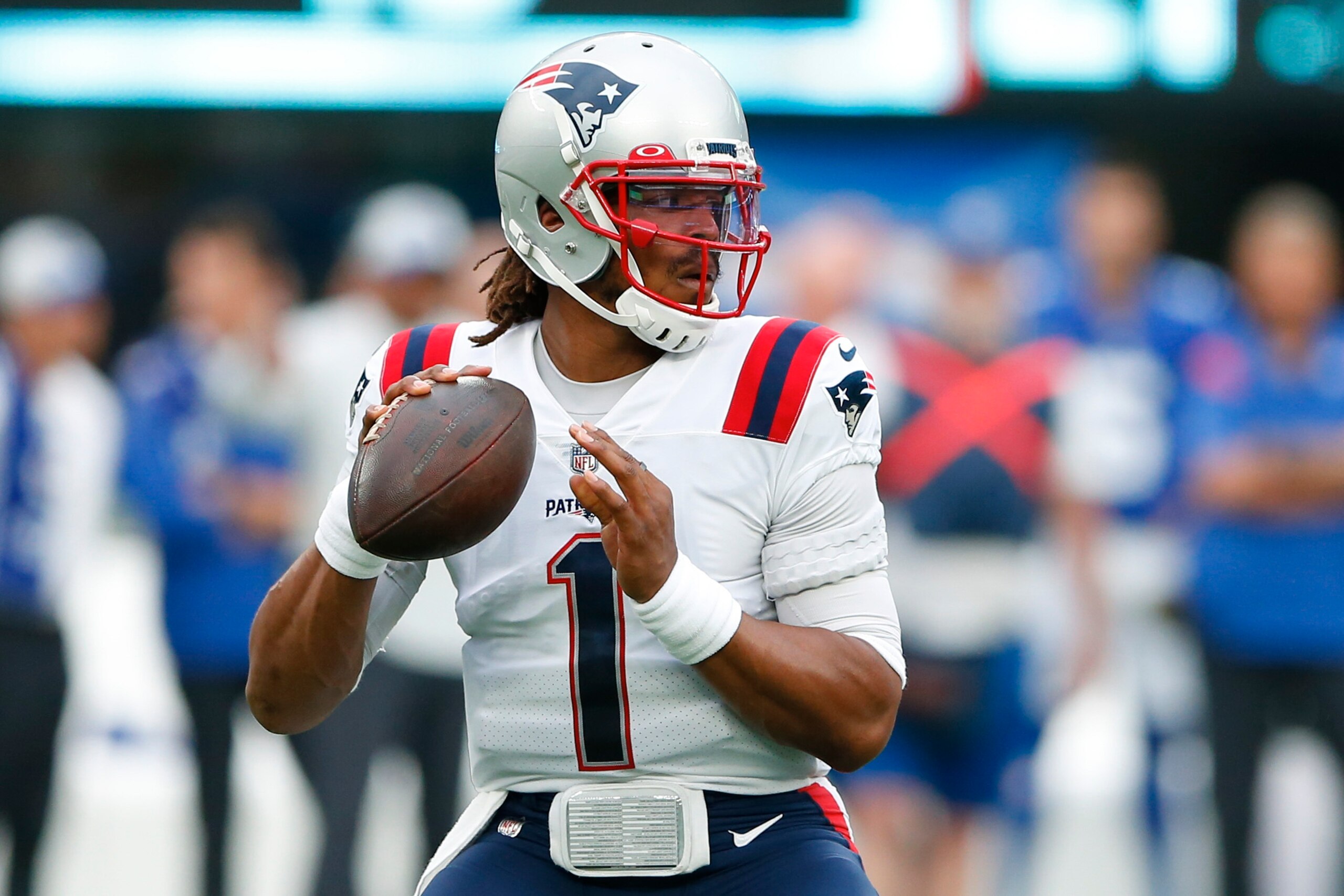 New England Patriots quarterback Cam Newton (1) throws a pass during the first half of an NFL preseason football game against the New York Giants Sunday, Aug. 29, 2021, in East Rutherford, N.J. (AP Photo/Noah K. Murray)