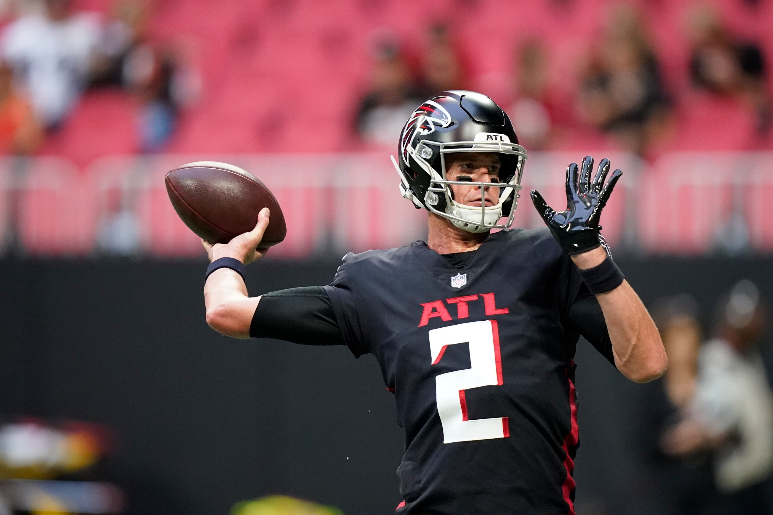 Atlanta Falcons quarterback Matt Ryan (2) warms up before the first half of a preseason NFL football game between the Atlanta Falcons and the Cleveland Browns, Sunday, Aug. 29, 2021, in Atlanta. (AP Photo/Brynn Anderson)