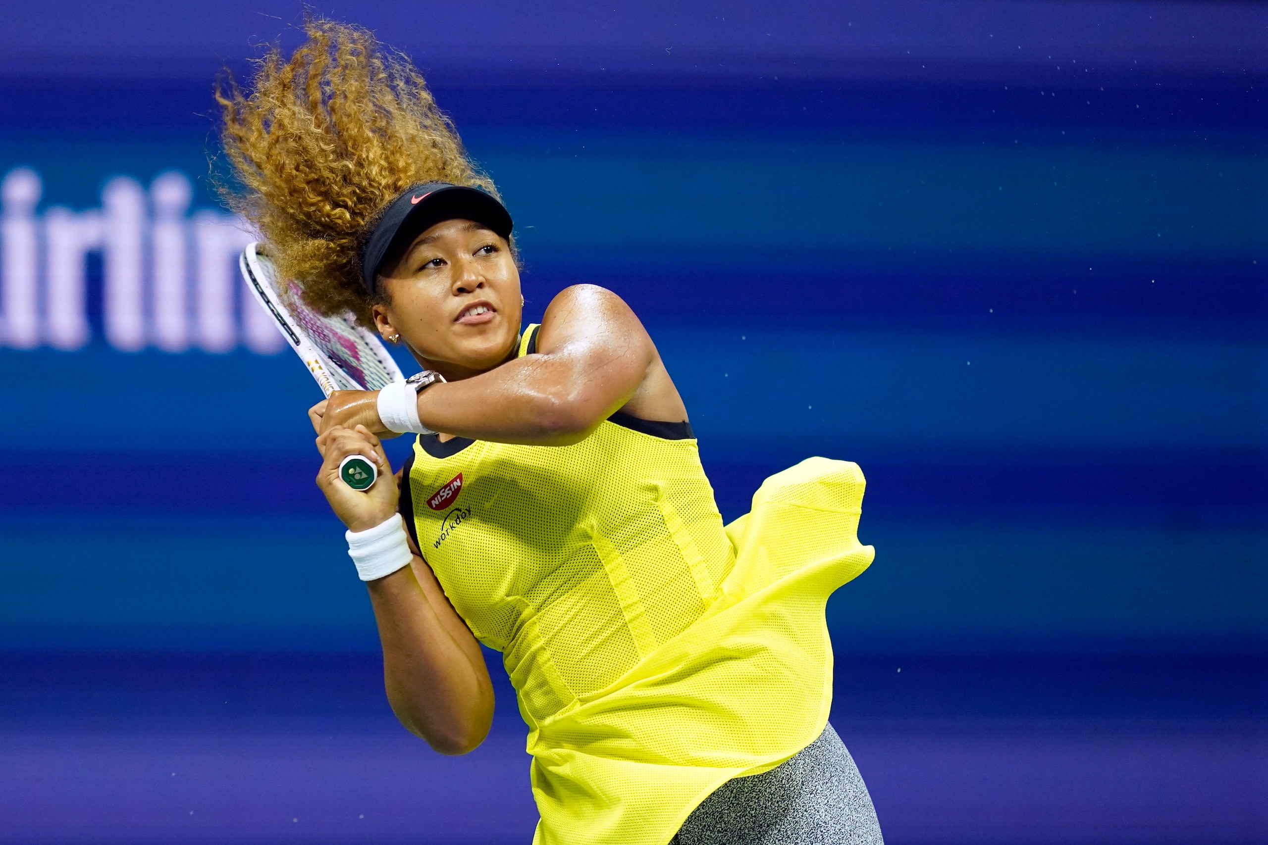 Naomi Osaka, of Japan, returns a shot to Marie Bouzkova, of the Czech Republic, during the first round of the US Open tennis championships, Monday, Aug. 30, 2021, in New York. (AP Photo/Elise Amendola)