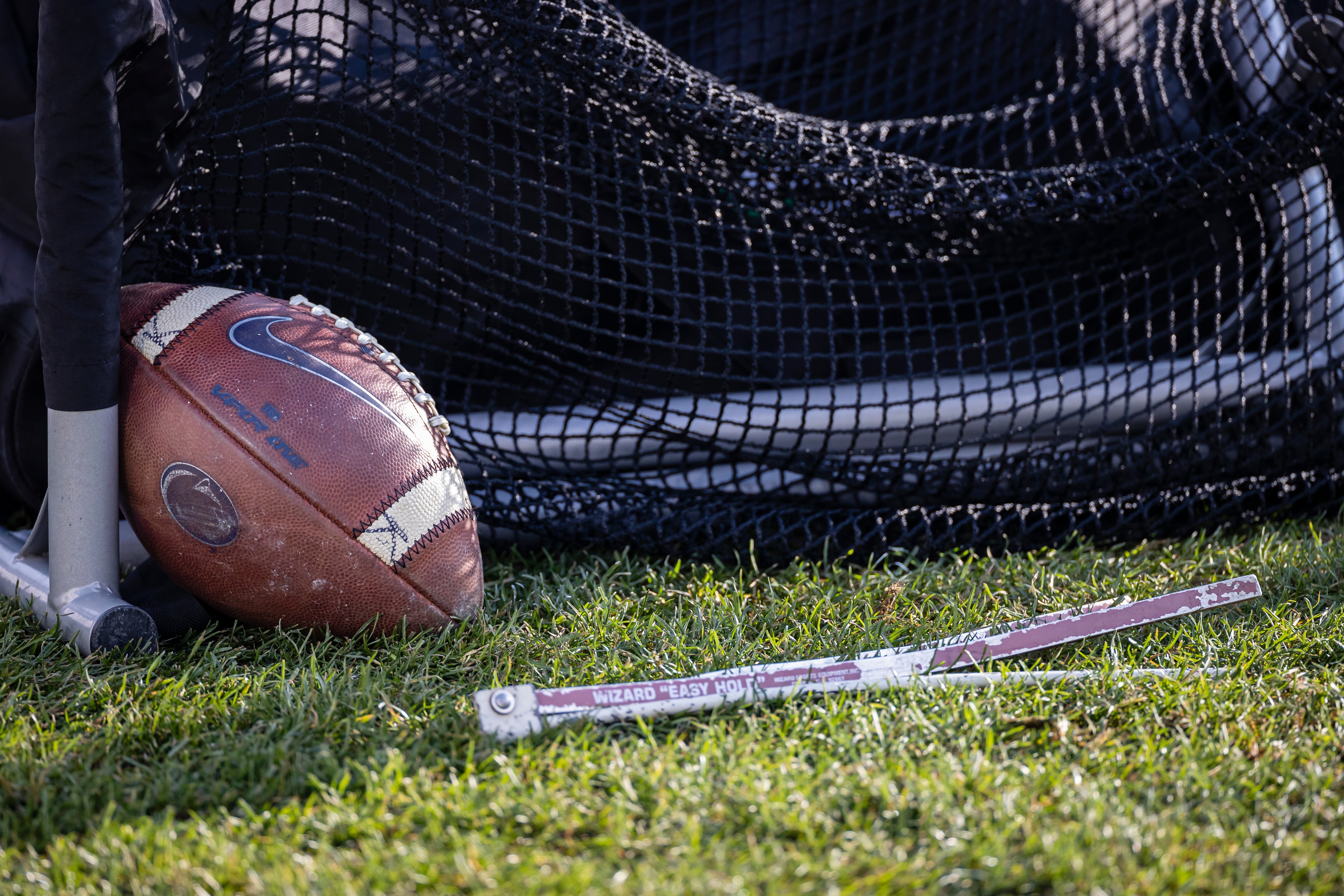 STATE COLLEGE, PA - DECEMBER 12: A detailed view of a Nike branded football with a Penn State Nittany Lions logo on the sidelines near a kicking net and tee during the second half of the game between the Penn State Nittany Lions and the Michigan State Spartans at Beaver Stadium on December 12, 2020 in State College, Pennsylvania. (Photo by Scott Taetsch/Getty Images)