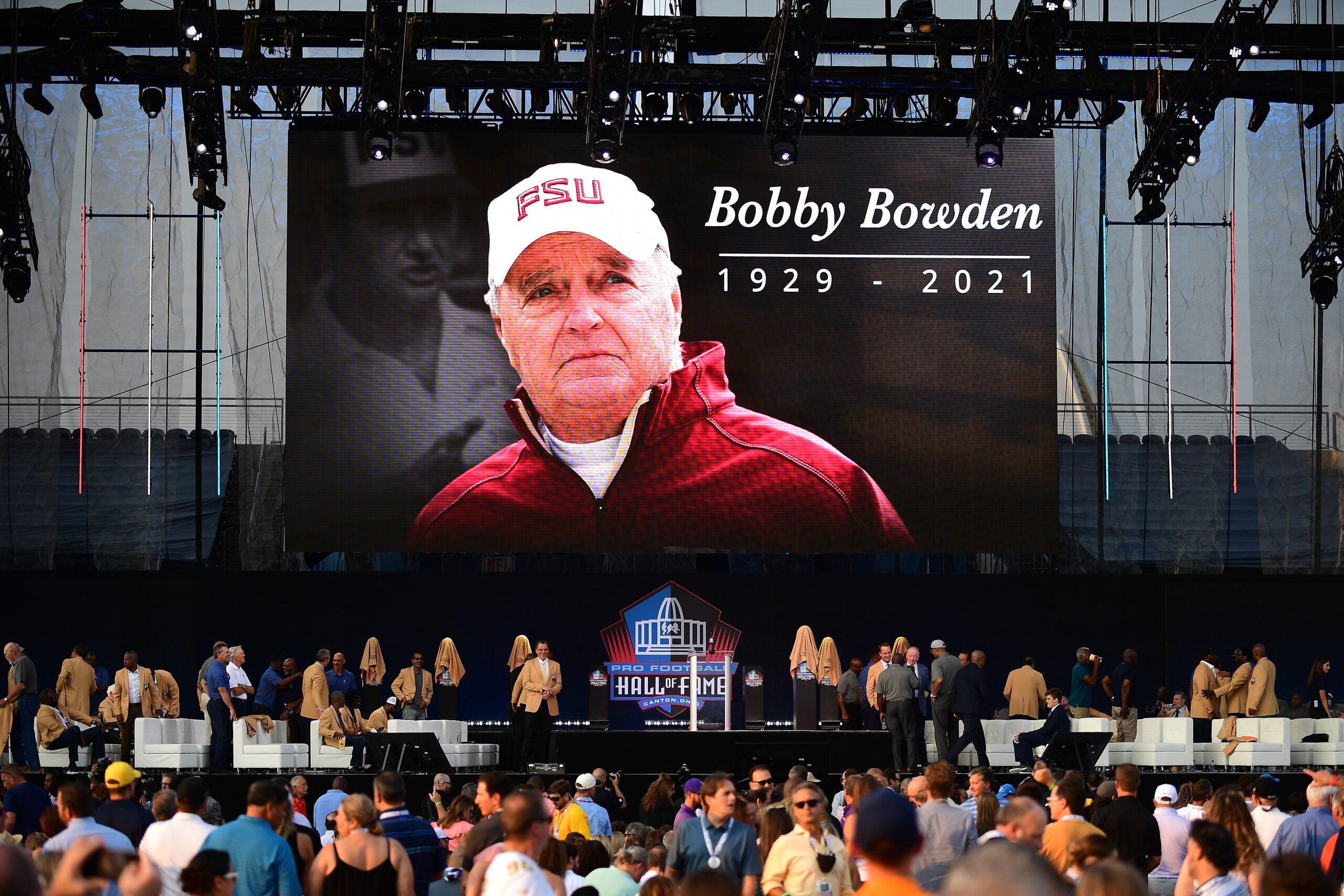 CANTON, OHIO - AUGUST 08: A view of a screen honoring Bobby Bowden during the NFL Hall of Fame Enshrinement Ceremony at Tom Benson Hall Of Fame Stadium on August 08, 2021 in Canton, Ohio. (Photo by Emilee Chinn/Getty Images)