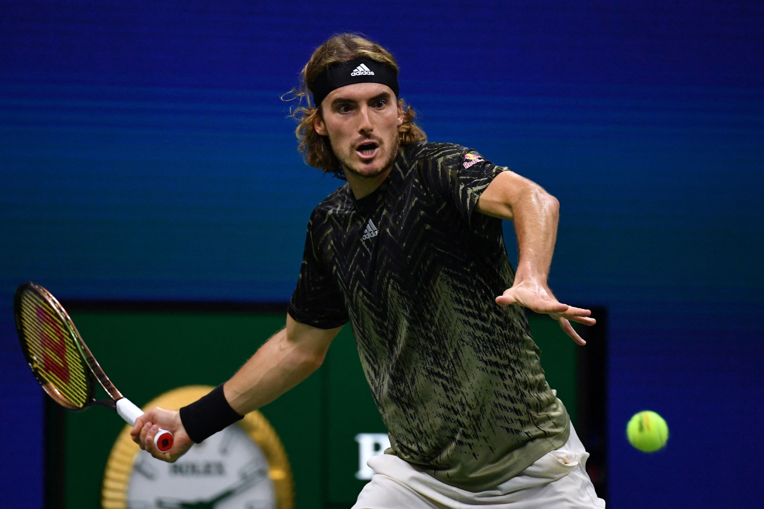 Greece's Stefanos Tsitsipas hits a return to France's Adrian Mannarino during their 2021 US Open Tennis tournament men's singles second round match at the USTA Billie Jean King National Tennis Center in New York, on September 1, 2021. (Photo by Ed JONES / AFP) (Photo by ED JONES/AFP via Getty Images)
