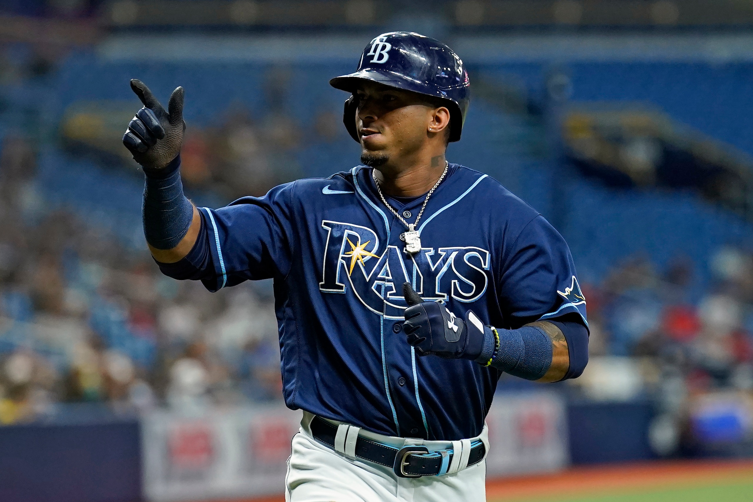 Tampa Bay Rays' Wander Franco celebrates after scoring on an RBI single by Austin Meadows off Boston Red Sox pitcher Stephen Gonsalves during the third inning of a baseball game Tuesday, Aug. 31, 2021, in St. Petersburg, Fla. (AP Photo/Chris O'Meara)