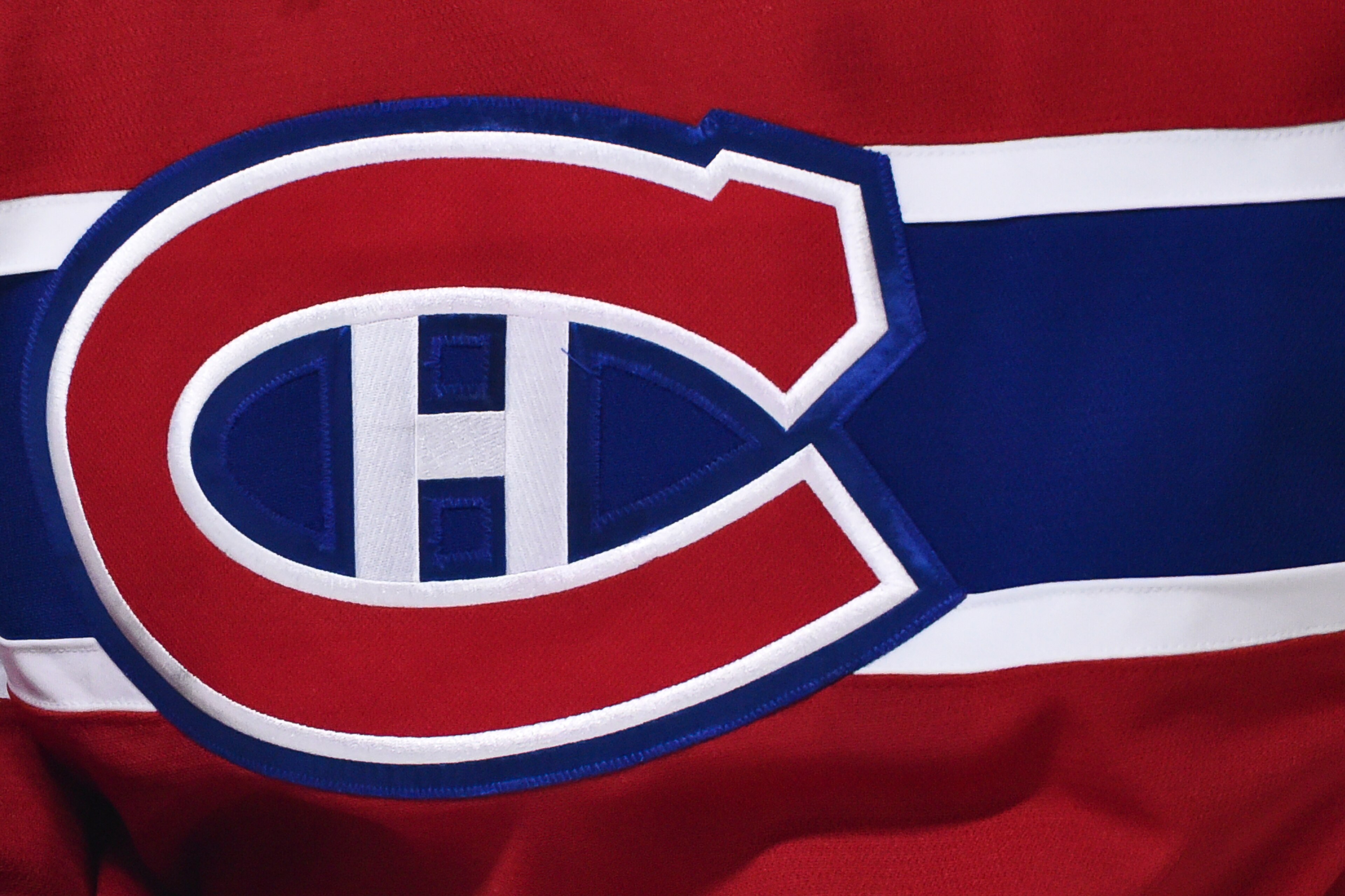 MONTREAL, QC - OCTOBER 17:  A detail of the Montreal Canadiens logo is seen during the first period against the Minnesota Wild at the Bell Centre on October 17, 2019 in Montreal, Canada.  The Montreal Canadiens defeated the Minnesota Wild 4-0.  (Photo by Minas Panagiotakis/Getty Images)