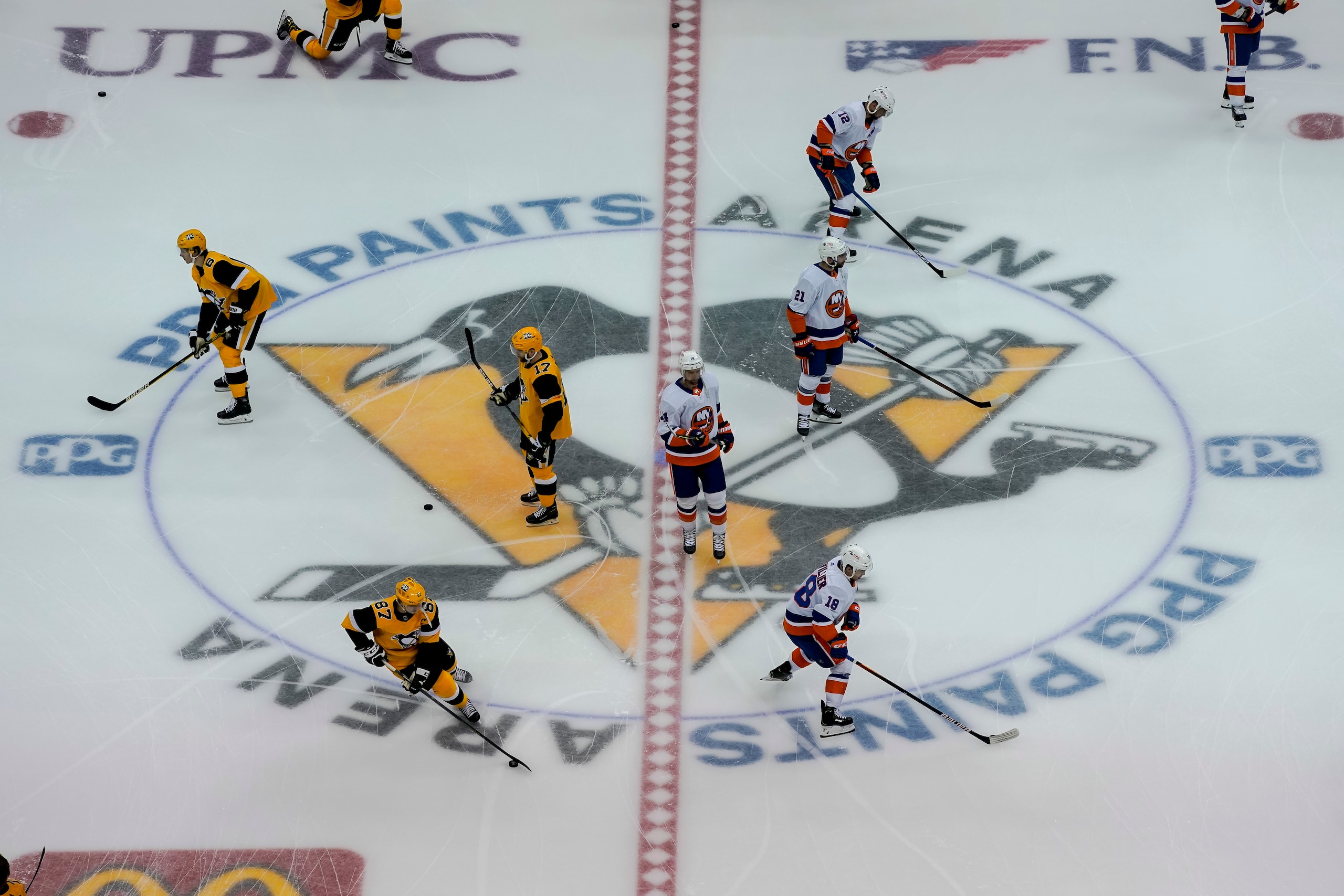 PITTSBURGH, PA - MAY 24: General view of center ice as the Pittsburgh Penguins and New York Islanders warm up before Game Five of the First Round in the 2021 NHL Stanley Cup Playoffs between the New York Islanders and the Pittsburgh Penguins on May 24, 2021, at PPG Paints Arena in Pittsburgh, PA. (Photo by Jeanine Leech/Icon Sportswire via Getty Images)
