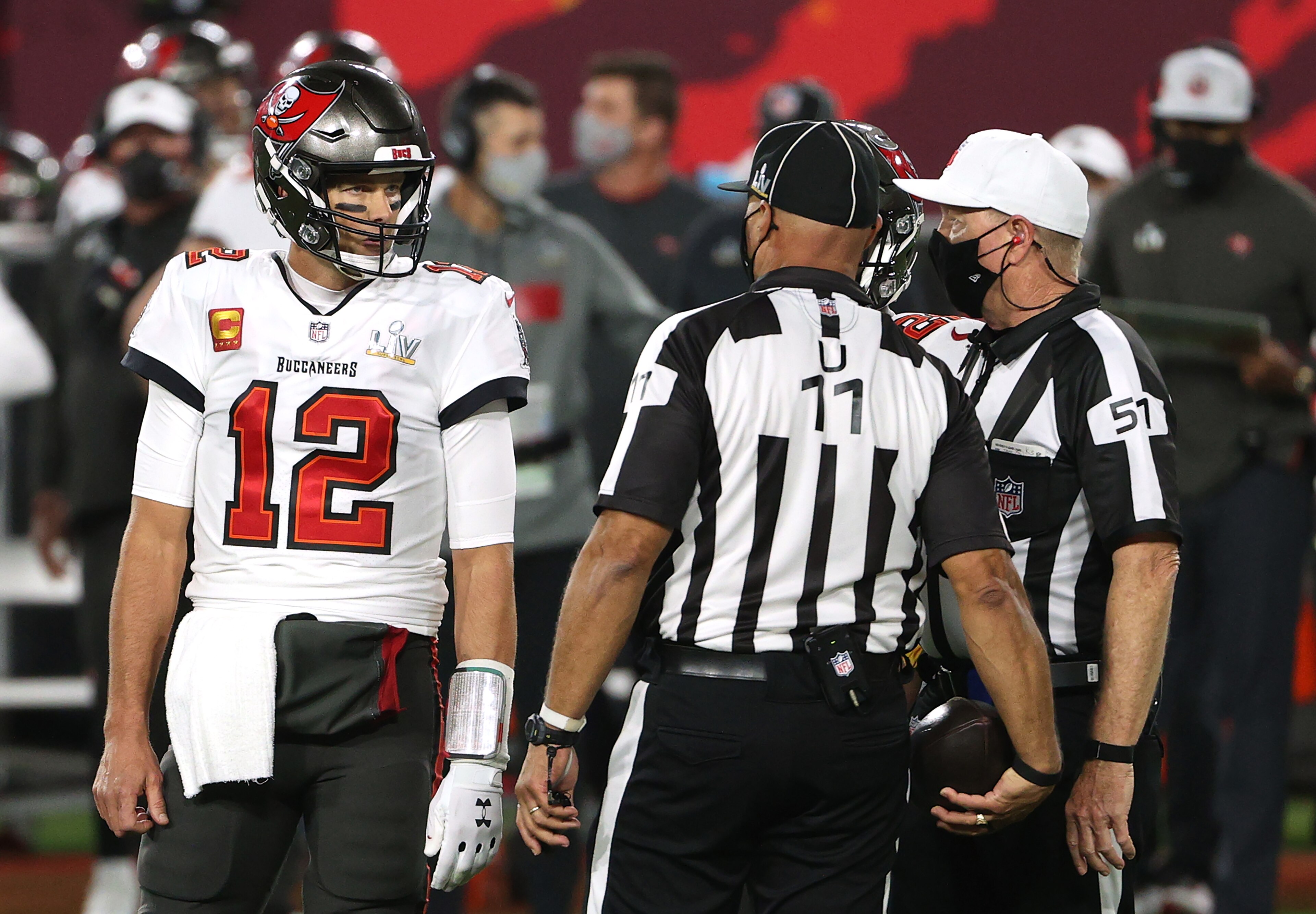 TAMPA, FLORIDA - FEBRUARY 07: Tom Brady #12 of the Tampa Bay Buccaneers speaks with umpire Fred Bryan #11 and referee Carl Cheffers #51 during the second quarter in Super Bowl LV at Raymond James Stadium on February 07, 2021 in Tampa, Florida. (Photo by Patrick Smith/Getty Images) TAMPA, FLORIDA - FEBRUARY 07: Tom Brady #12 of the Tampa Bay Buccaneers speaks with umpire Fred Bryan #11 and referee Carl Cheffers #51 during the second quarter in Super Bowl LV at Raymond James Stadium on February 07, 2021 in Tampa, Florida. (Photo by Patrick Smith/Getty Images)