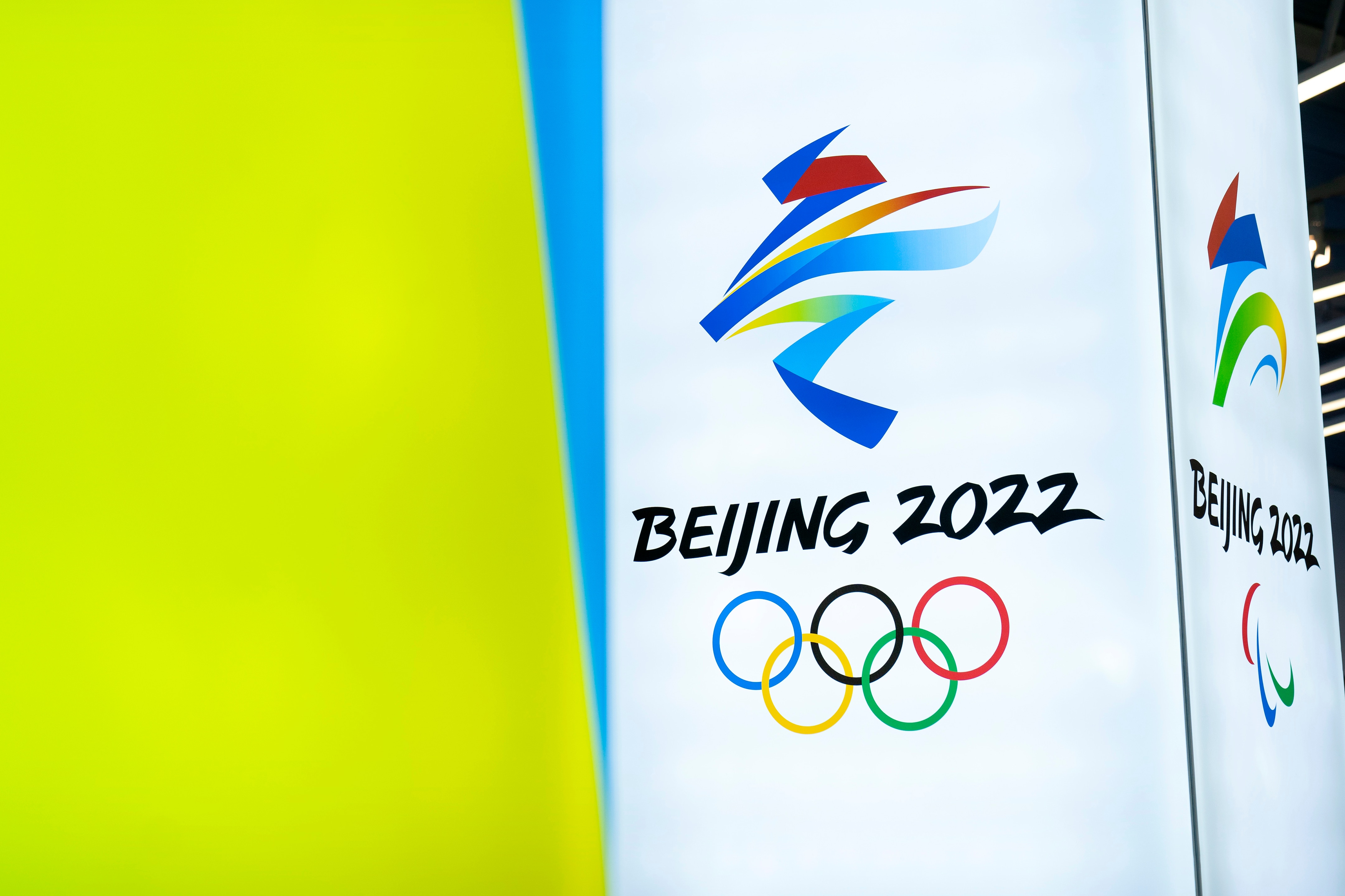 FILE - In this Feb. 5, 2021, file photo, the logos for the 2022 Beijing Winter Olympics and Paralympics are seen during an exhibit at a visitors center at the Winter Olympic venues in Yanqing on the outskirts of Beijing. Groups alleging human-rights abuses in China are calling for a full boycott of the Beijing Olympics, which is sure to ratchet up pressure on the International Olympic Committee, athletes, sponsors, and sports federations. A coalition of activists representing Uyghurs, Tibetans, residents of Hong Kong and others, issued a statement Monday, May 17, 2021 calling for the “full boycott,” eschewing lesser measures like “diplomatic boycotts" and negotiations with the IOC or China. (AP Photo/Mark Schiefelbein, File)