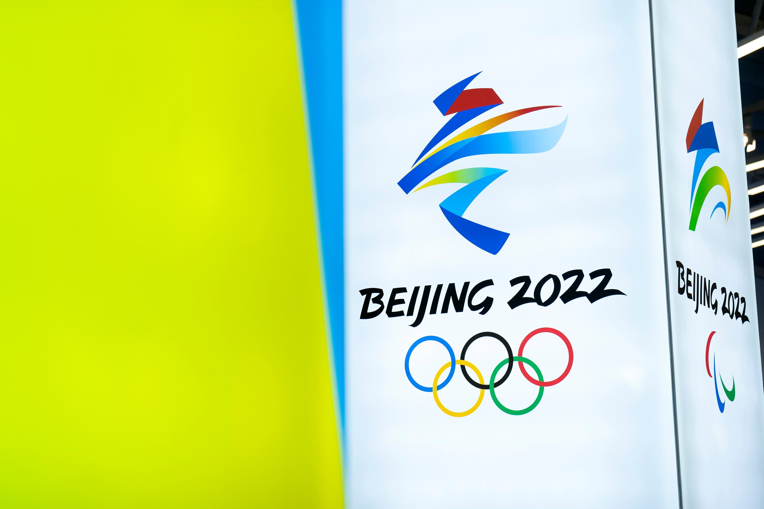 FILE - In this Feb. 5, 2021, file photo, the logos for the 2022 Beijing Winter Olympics and Paralympics are seen during an exhibit at a visitors center at the Winter Olympic venues in Yanqing on the outskirts of Beijing. Groups alleging human-rights abuses in China are calling for a full boycott of the Beijing Olympics, which is sure to ratchet up pressure on the International Olympic Committee, athletes, sponsors, and sports federations. A coalition of activists representing Uyghurs, Tibetans, residents of Hong Kong and others, issued a statement Monday, May 17, 2021 calling for the “full boycott,” eschewing lesser measures like “diplomatic boycotts" and negotiations with the IOC or China. (AP Photo/Mark Schiefelbein, File)