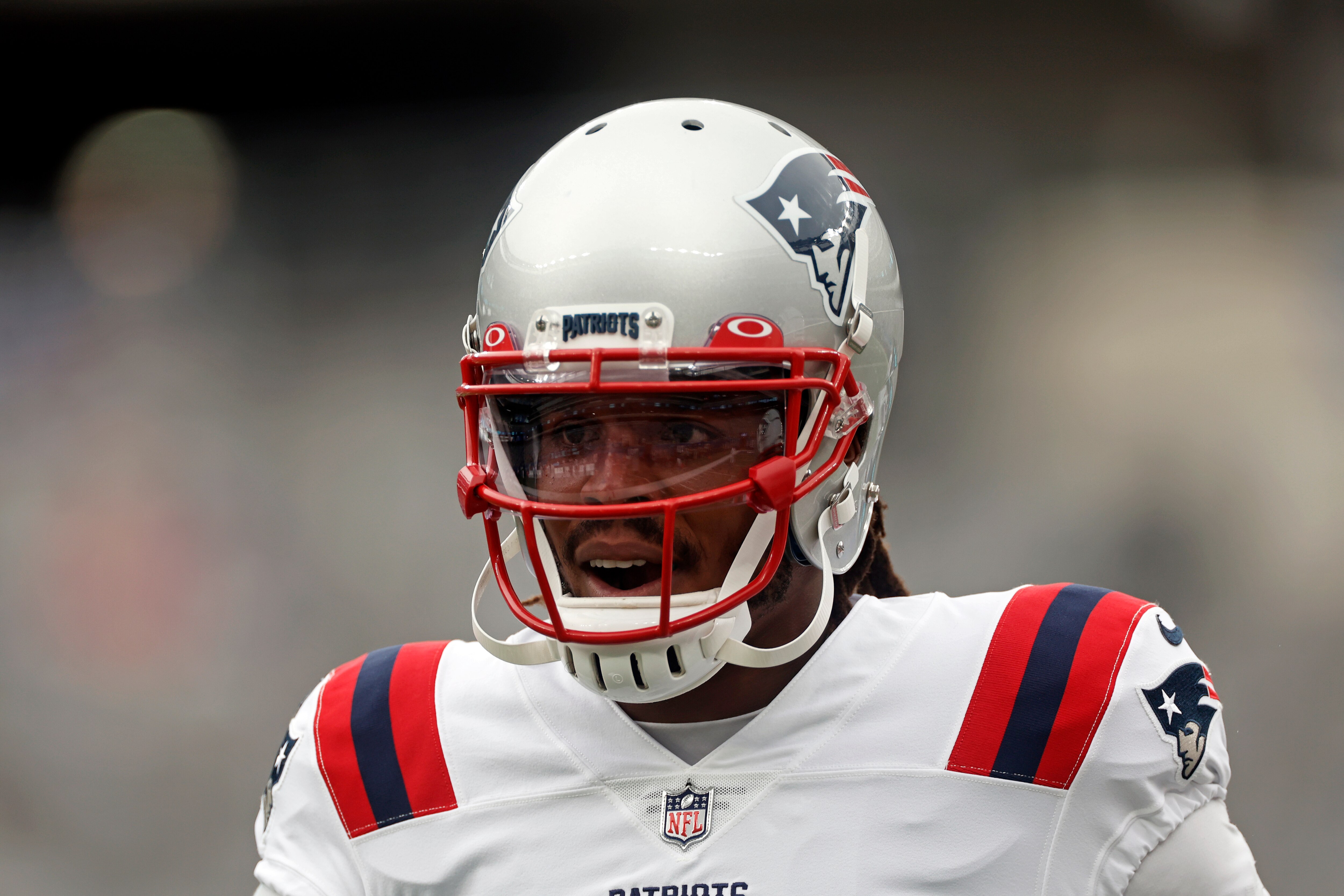 New England Patriots quarterback Cam Newton (1) warms up before an NFL preseason football game against the New York Giants, Sunday, Aug. 29, 2021, in East Rutherford, N.J. (AP Photo/Adam Hunger)