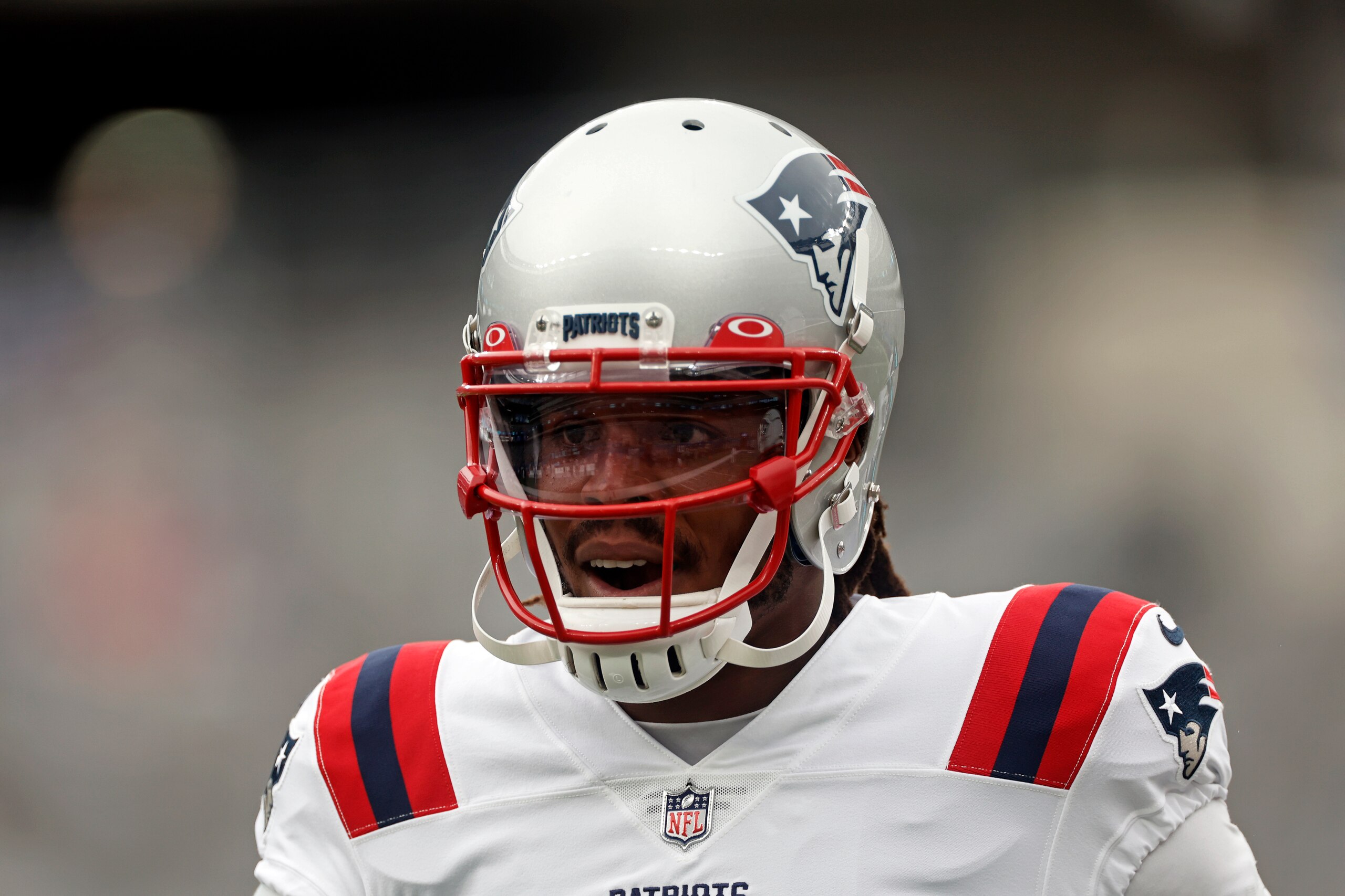 New England Patriots quarterback Cam Newton (1) warms up before an NFL preseason football game against the New York Giants, Sunday, Aug. 29, 2021, in East Rutherford, N.J. (AP Photo/Adam Hunger)