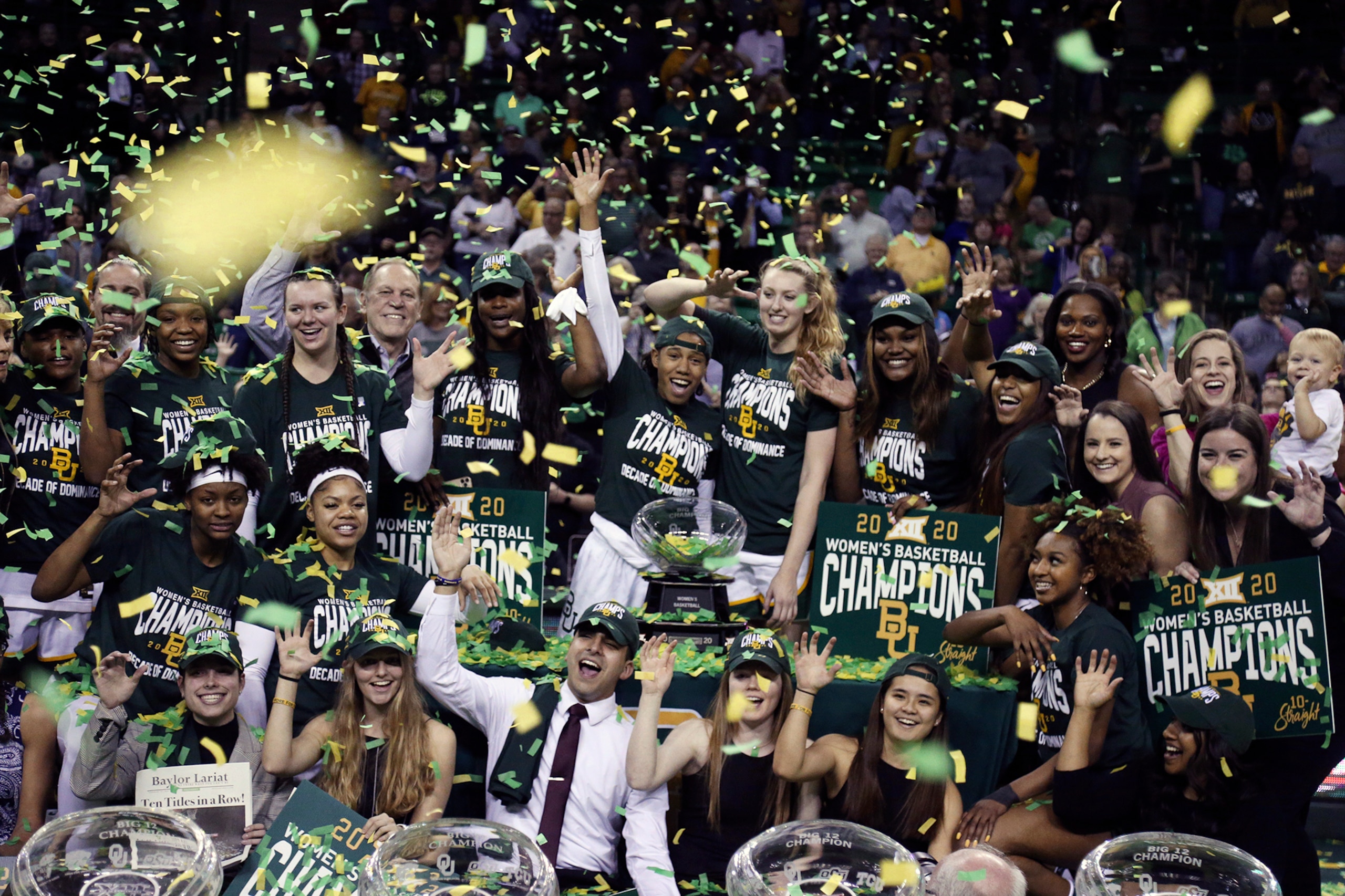 Baylor women's basketball team celebrate their tenth-straight Big 12 regular season championship following an NCAA college basketball game against Kansas State, Saturday, Feb. 29, 2020, in Waco, Texas. (AP Photo/Rod Aydelotte)