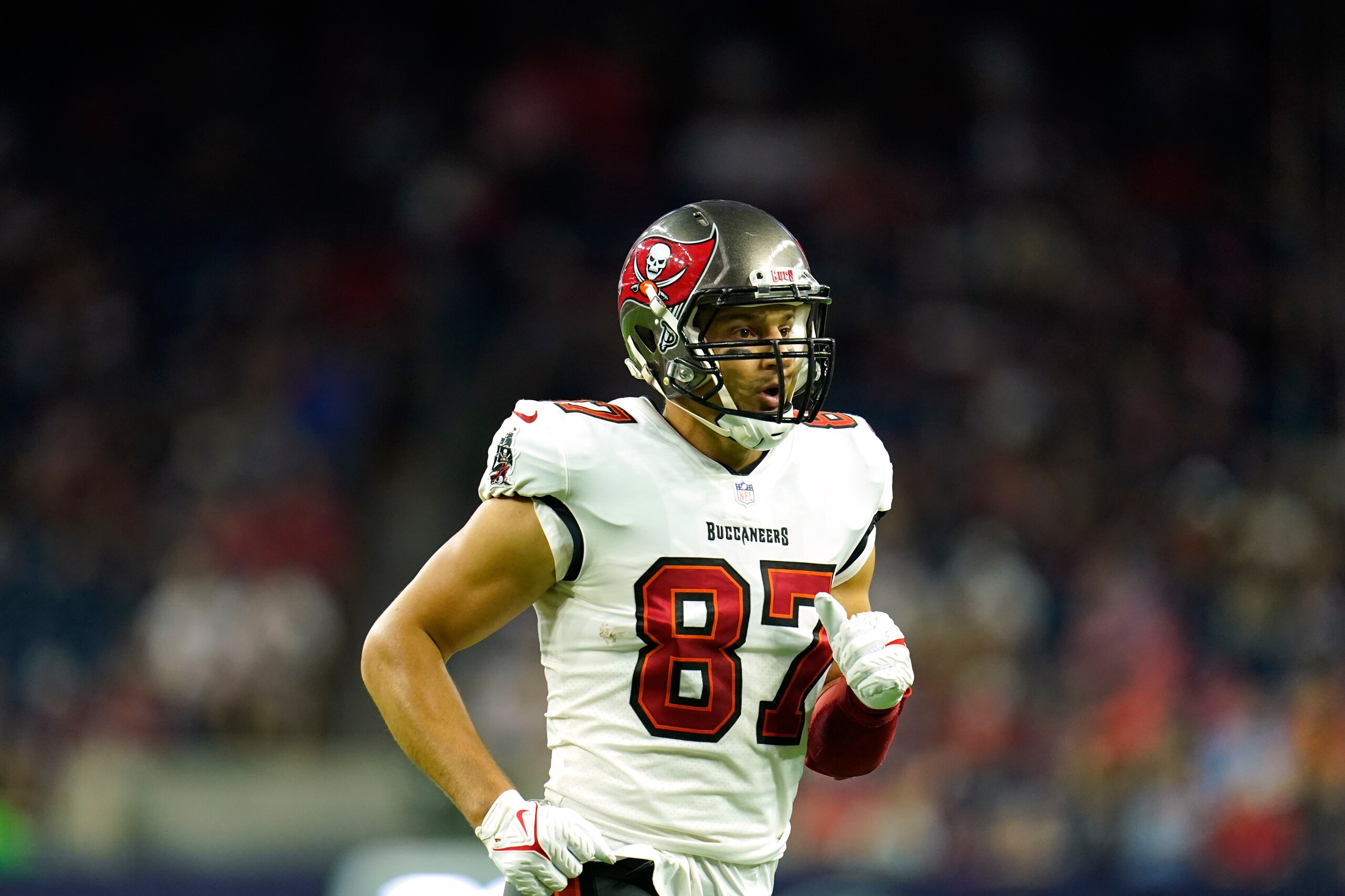 Tampa Bay Buccaneers tight end Rob Gronkowski (87) jogs onto the field during an NFL preseason football game against the Houston Texans, Saturday, Aug. 28, 2021, in Houston. (AP Photo/Matt Patterson)