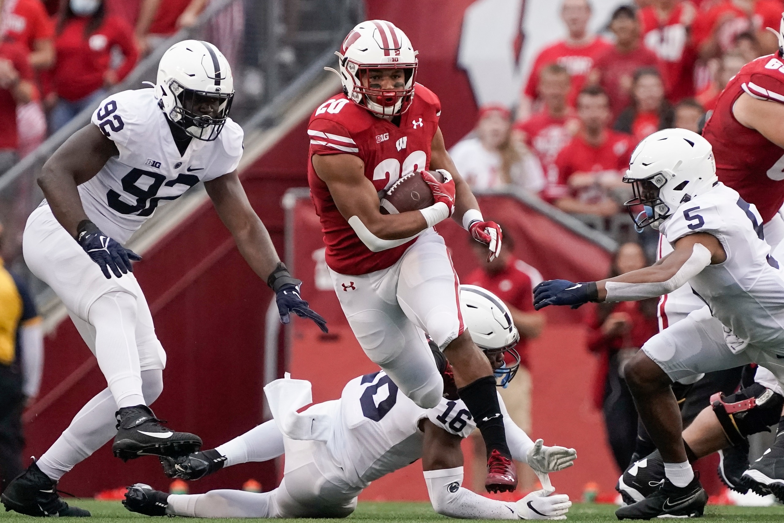 Wisconsin's Isaac Guerendo runs for a first down during the first half of an NCAA college football game against Penn State Saturday, Sept. 4, 2021, in Madison, Wis. (AP Photo/Morry Gash)