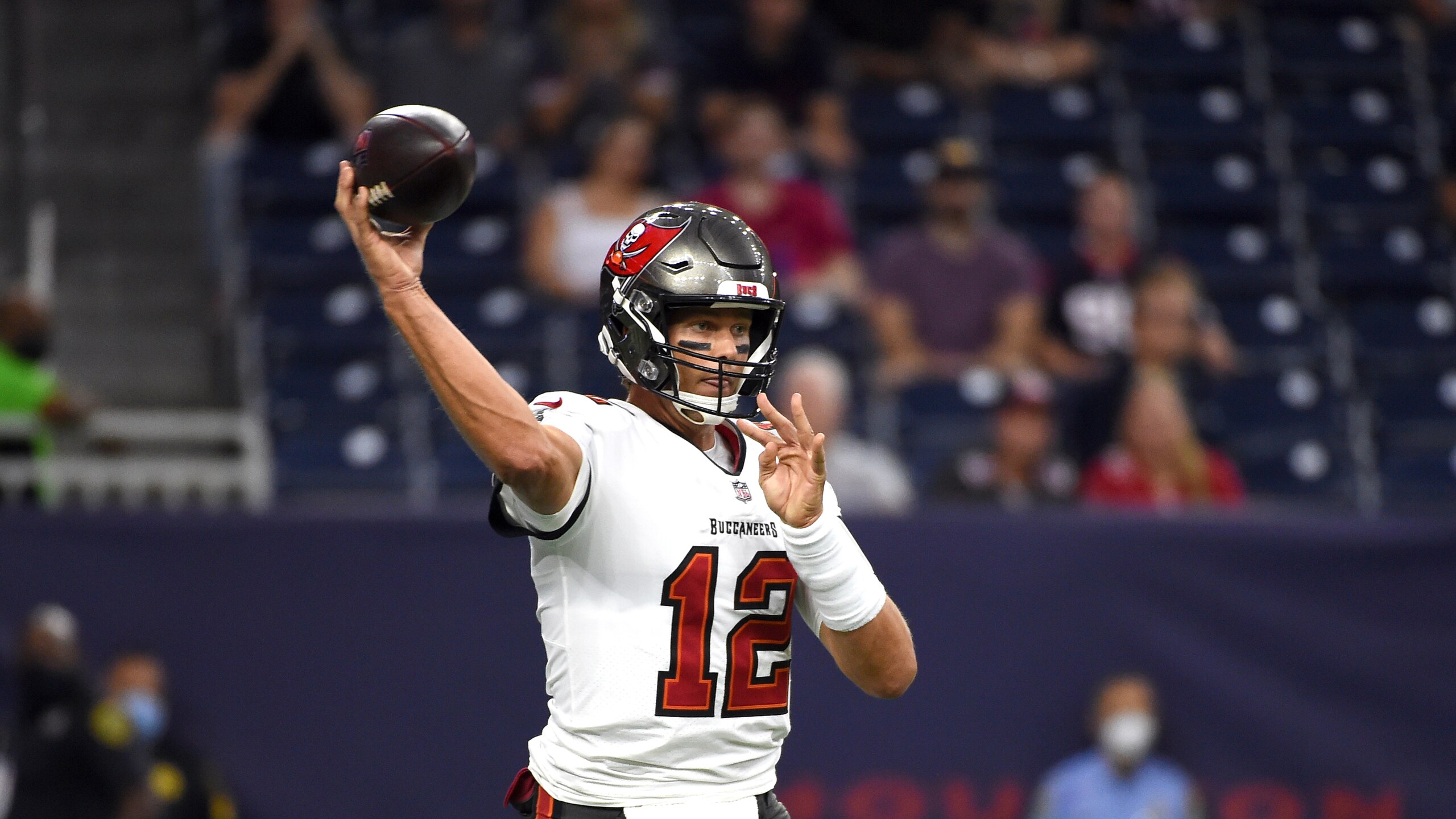 Tampa Bay Buccaneers quarterback Tom Brady throws a pass against the Houston Texans during the first half of an NFL preseason football game Saturday, Aug. 28, 2021, in Houston. (AP Photo/Eric Christian Smith)