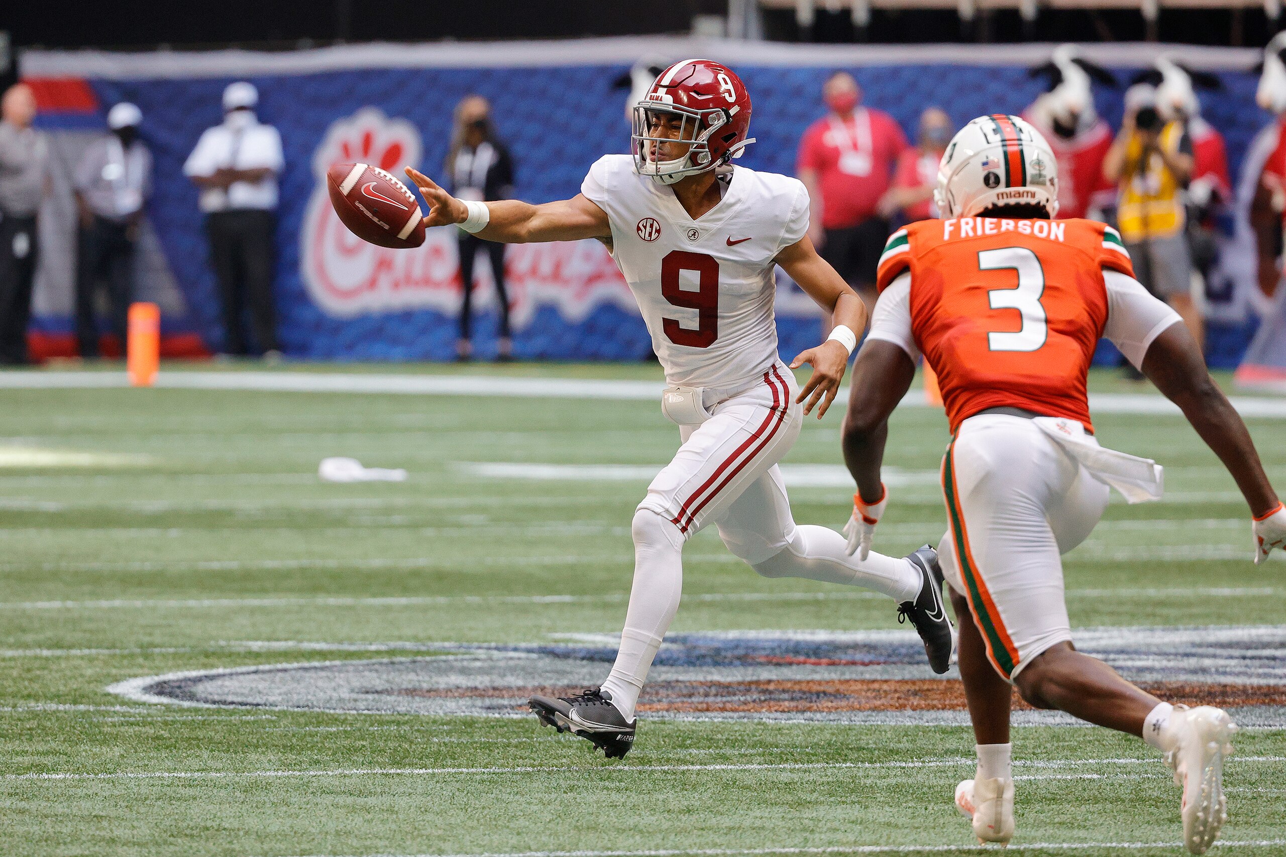 ATLANTA, GA - SEPTEMBER 04: Bryce Young (9) of the Alabama Crimson Tide laterals the football during the Chick-fil-A Kickoff Game between the Alabama Crimson Tide and the Miami Hurricanes on September 4, 2021 at Mercedes-Benz Stadium in Atlanta, Georgia.   (Photo by David J. Griffin/Icon Sportswire via Getty Images)