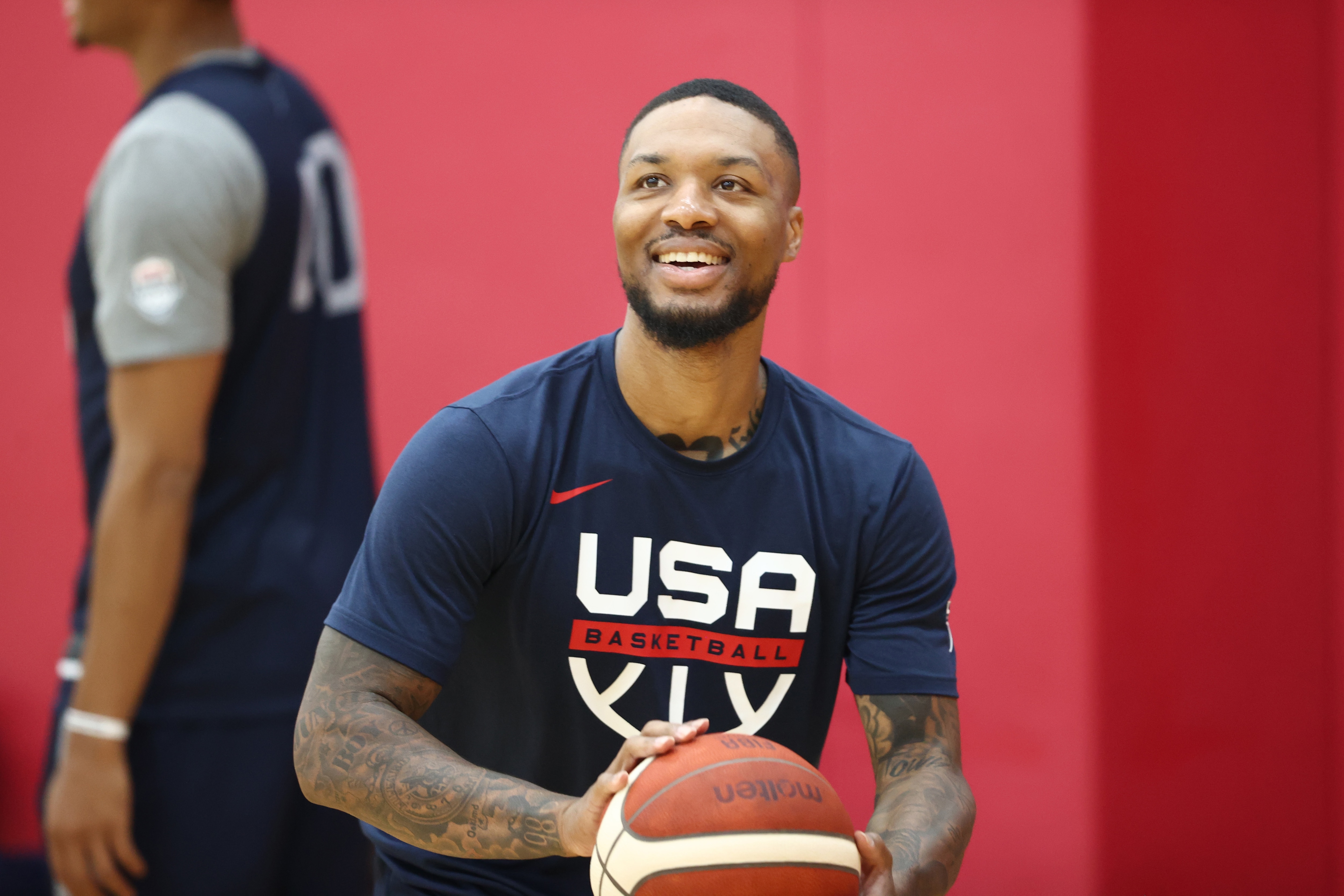 LAS VEGAS, NV - JULY 9: Damian Lillard #6 of the USA Men's National Team smiles during practice for training camp on July 9, 2021 at Mendenhall Center in Las Vegas, Nevada. NOTE TO USER: User expressly acknowledges and agrees that, by downloading and or using this photograph, User is consenting to the terms and conditions of the Getty Images License Agreement. (Photo by Ned Dishman/NBAE via Getty Images)