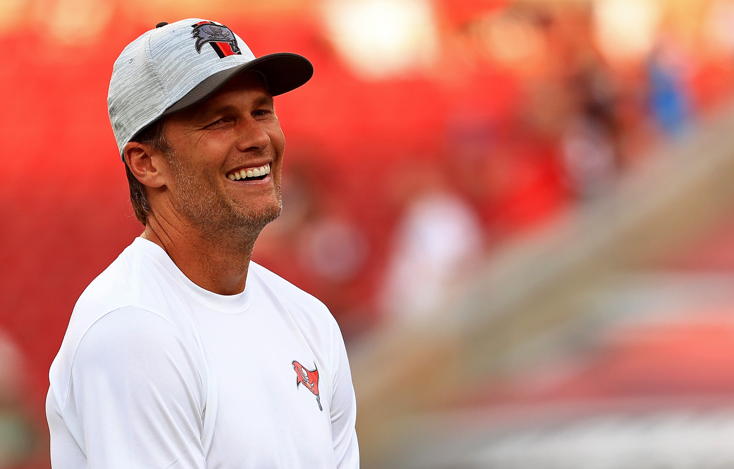 TAMPA, FLORIDA - AUGUST 21: Tom Brady #12 of the Tampa Bay Buccaneers looks on during a preseason game against the Tennessee Titans at Raymond James Stadium on August 21, 2021 in Tampa, Florida. (Photo by Mike Ehrmann/Getty Images)