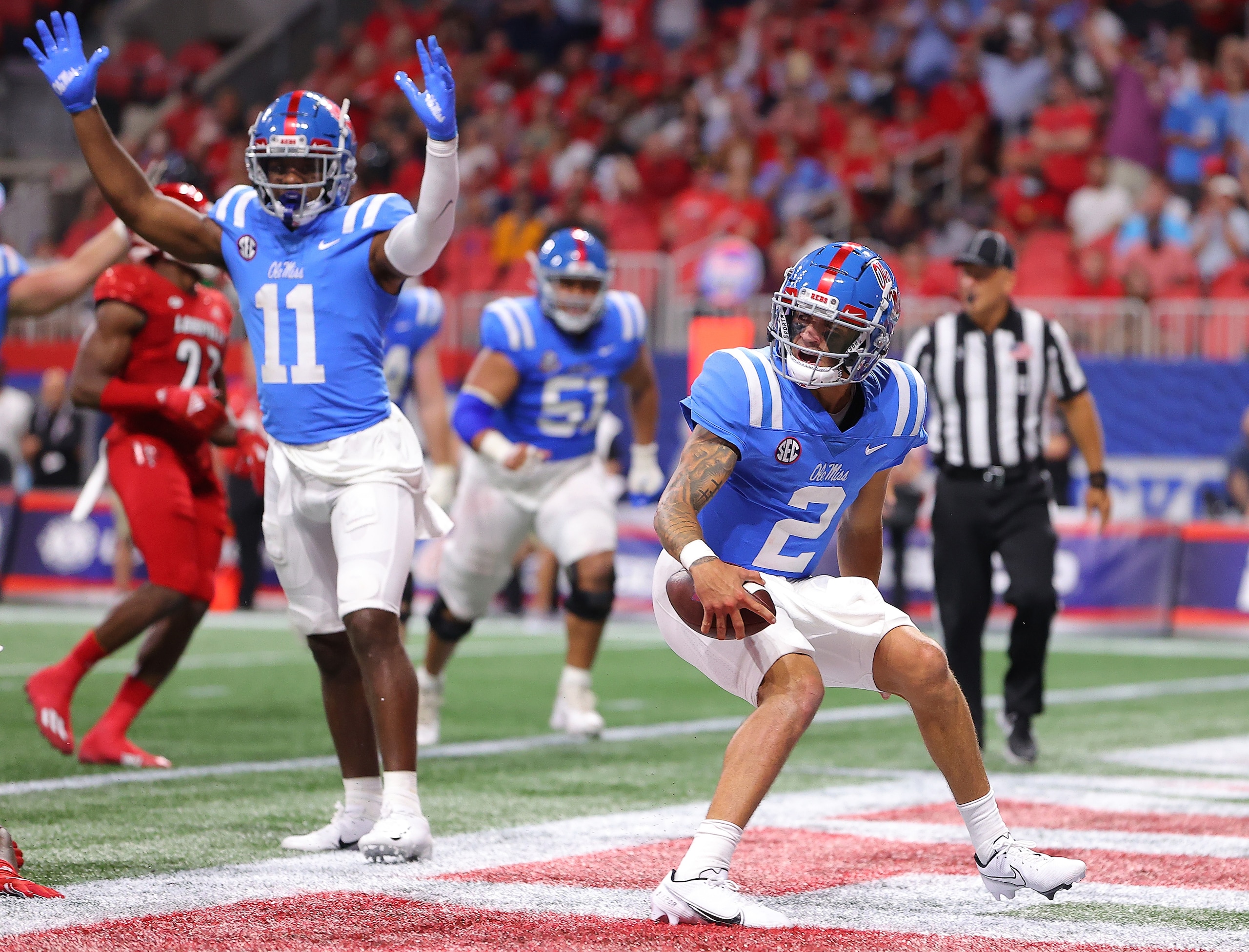 ATLANTA, GEORGIA - SEPTEMBER 06:  Matt Corral #2 of the Mississippi Rebels reacts after scoring a touchdown against the Louisville Cardinals during the first half of the Chick-fil-A Kick-Off Game at Mercedes-Benz Stadium on September 06, 2021 in Atlanta, Georgia. (Photo by Kevin C. Cox/Getty Images)