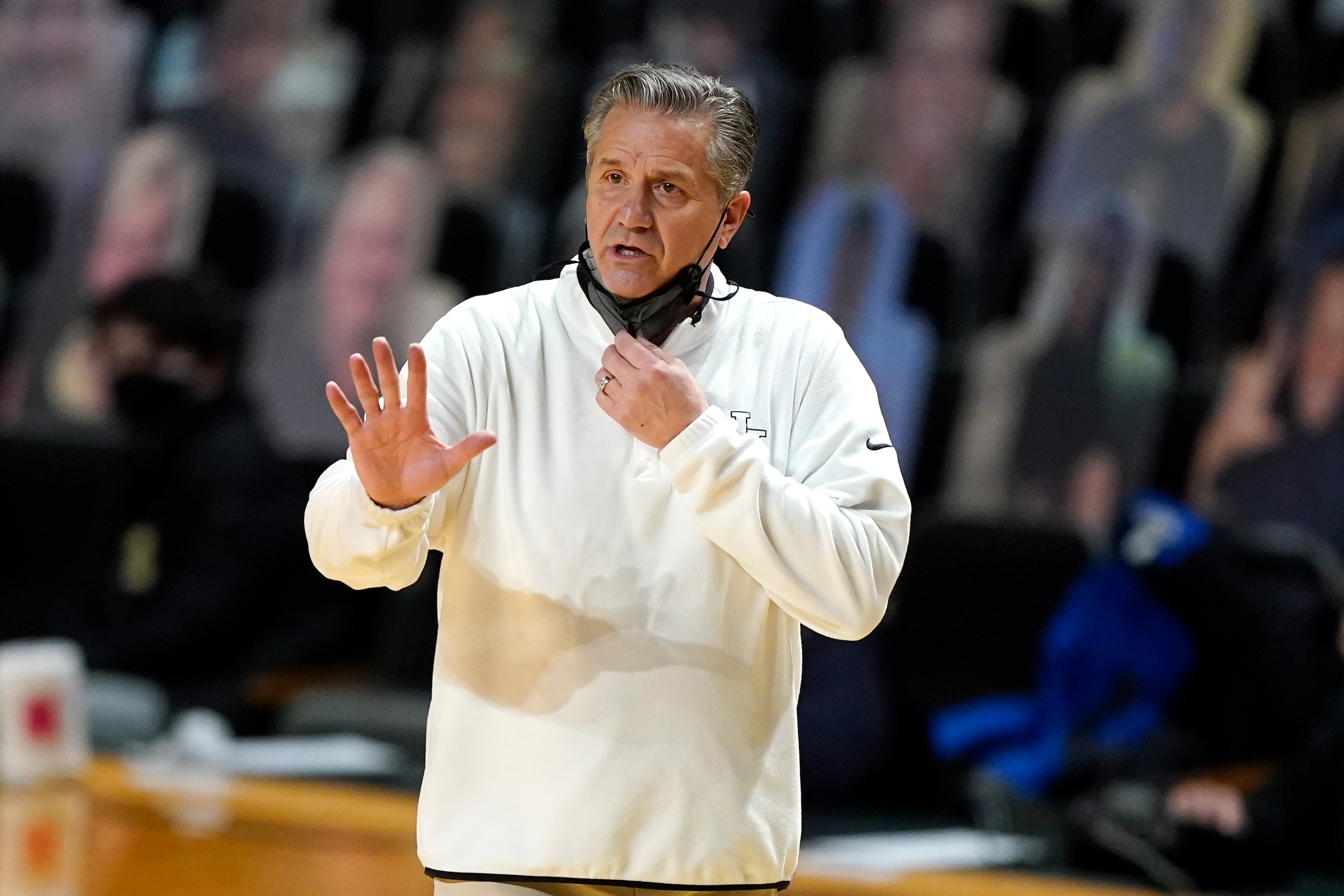 Kentucky head coach John Calipari watches the action in the first half of an NCAA college basketball game against Vanderbilt Wednesday, Feb. 17, 2021, in Nashville, Tenn. (AP Photo/Mark Humphrey) Kentucky head coach John Calipari watches the action in the first half of an NCAA college basketball game against Vanderbilt Wednesday, Feb. 17, 2021, in Nashville, Tenn. (AP Photo/Mark Humphrey)