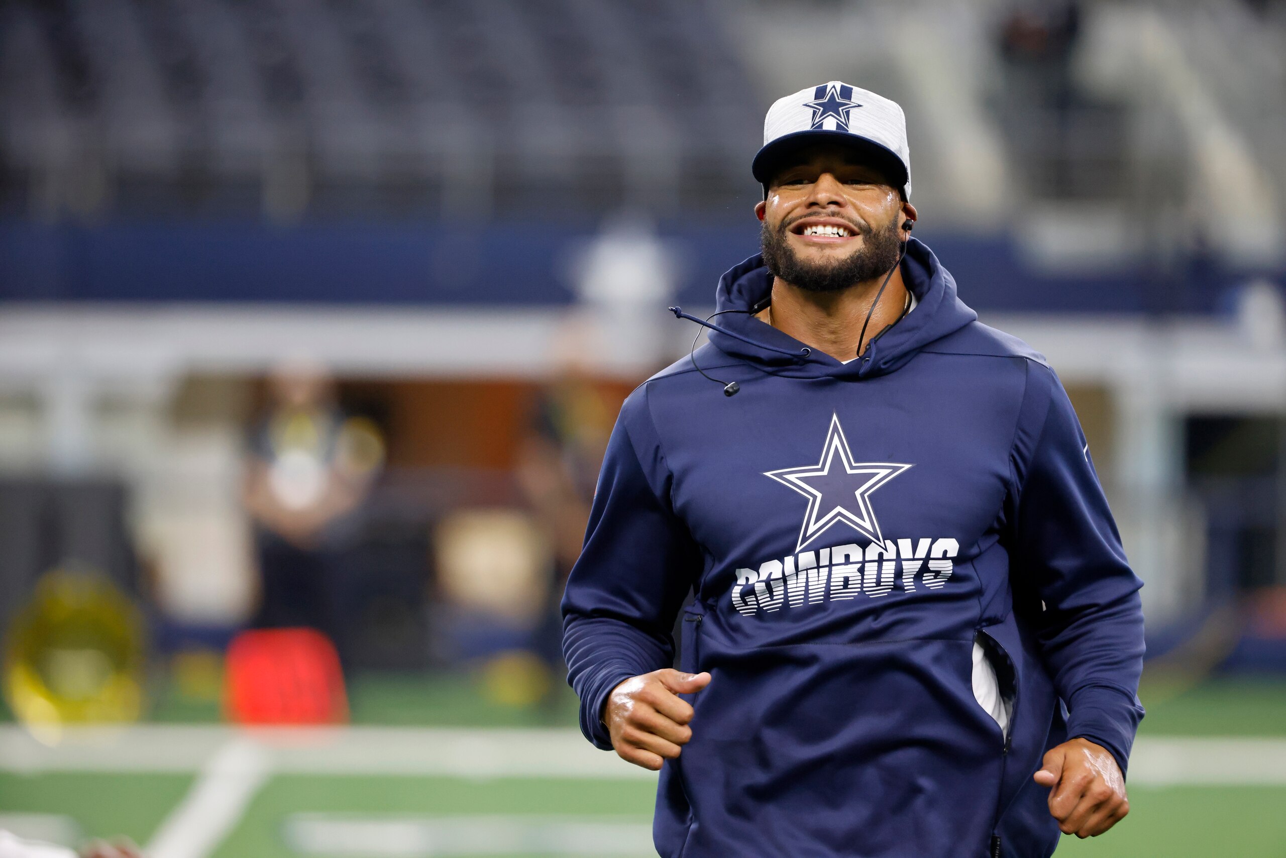 Dallas Cowboys quarterback Dak Prescott warms up before a preseason NFL football game against the Jacksonville Jaguars in Arlington, Texas, Sunday, Aug. 29, 2021. (AP Photo/Ron Jenkins)
